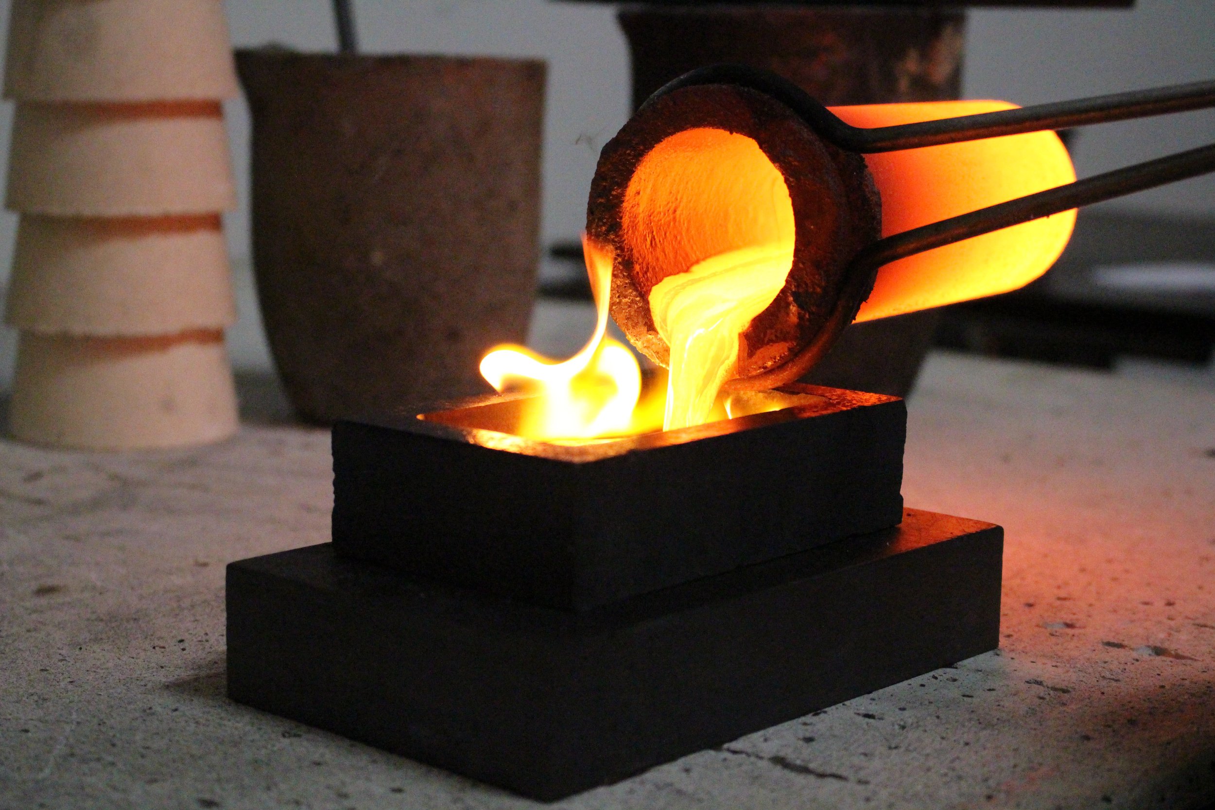 The principle of induction melting is that a high voltage electrical source from a primary coil induces a low voltage, high current in the metal, or secondary coil. Induction heating is simply a method of transferring heat energy.
