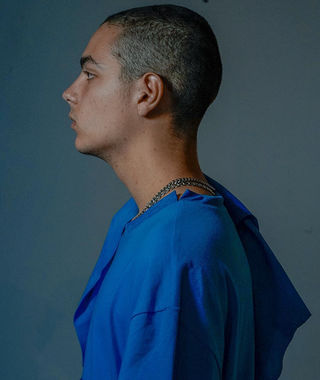 Side profile of our signature slits on our Electric Blue &lsquo;Scanners&rsquo; Suede Collar T. GENSSAUVAGES.COM