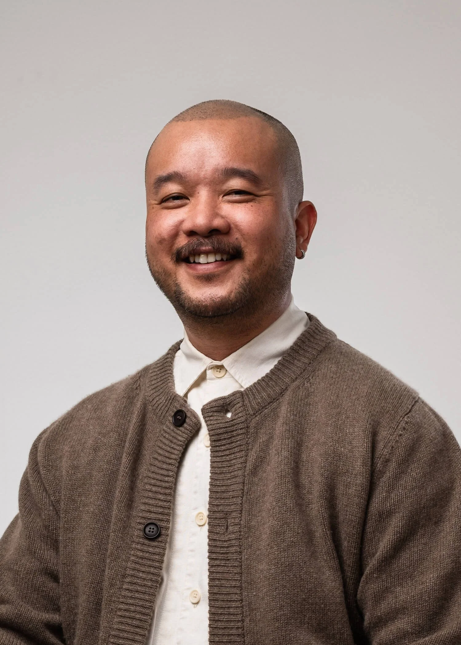 Color studio headshot of Anthony, smiling — professional headshot photography by Daniel Ponce, San Francisco