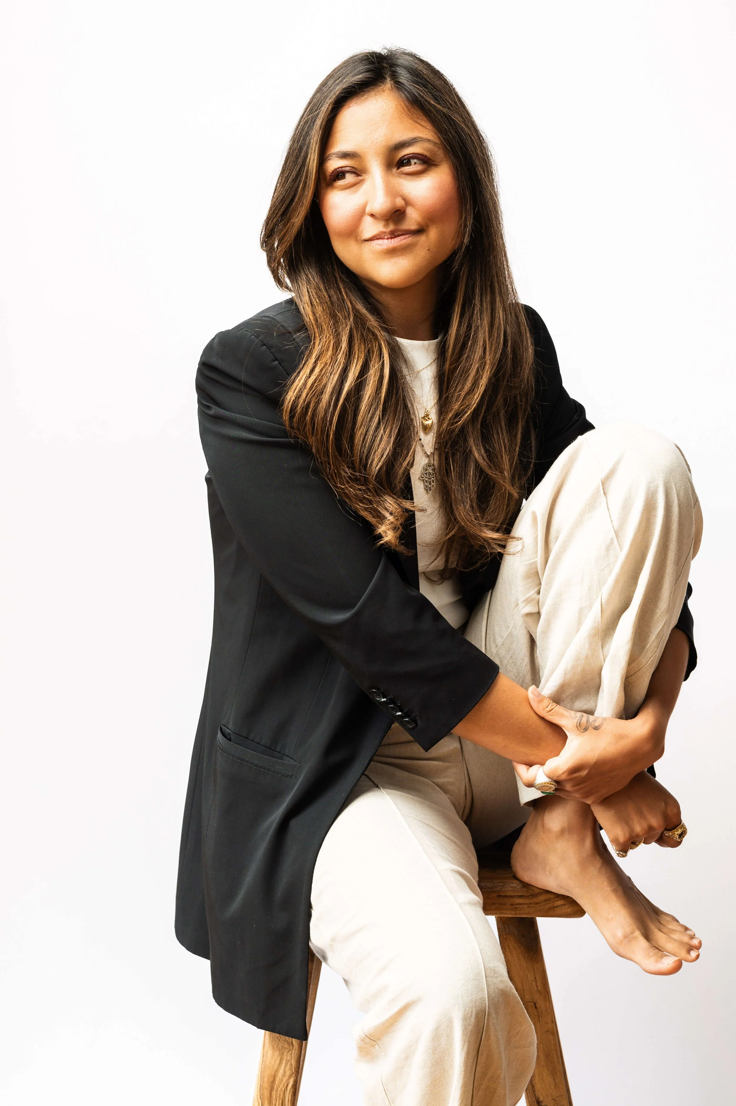 Black and white studio portrait of Cecilia Ponce, seated — personal branding photography by Daniel Ponce, San Francisco