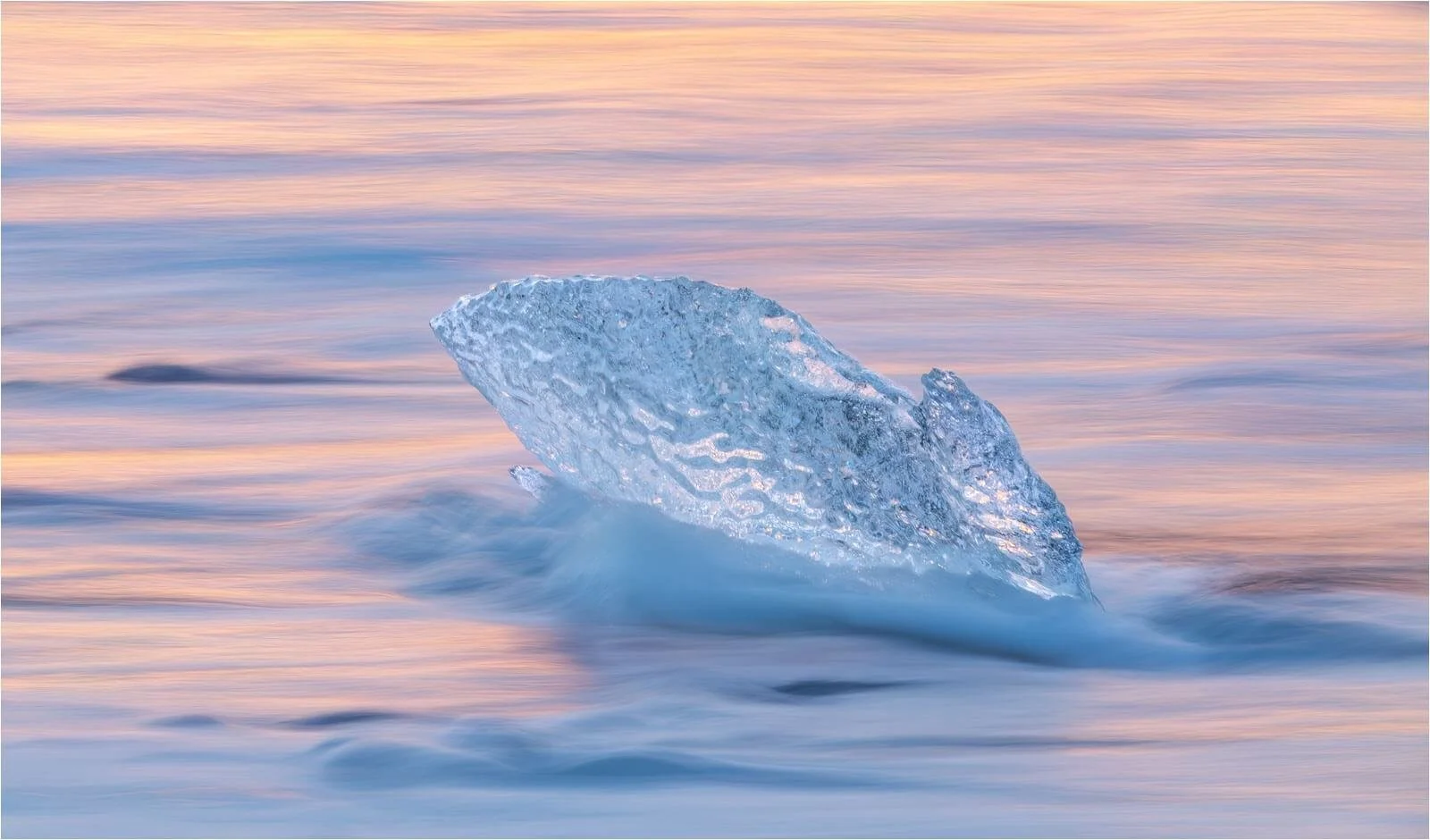 Glacial Ice in Ocean at Sunrise - Laura White