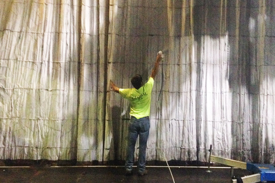 House of Blues Orlando Stage Curtain being Field-Treated with Fire Retardant.jpg