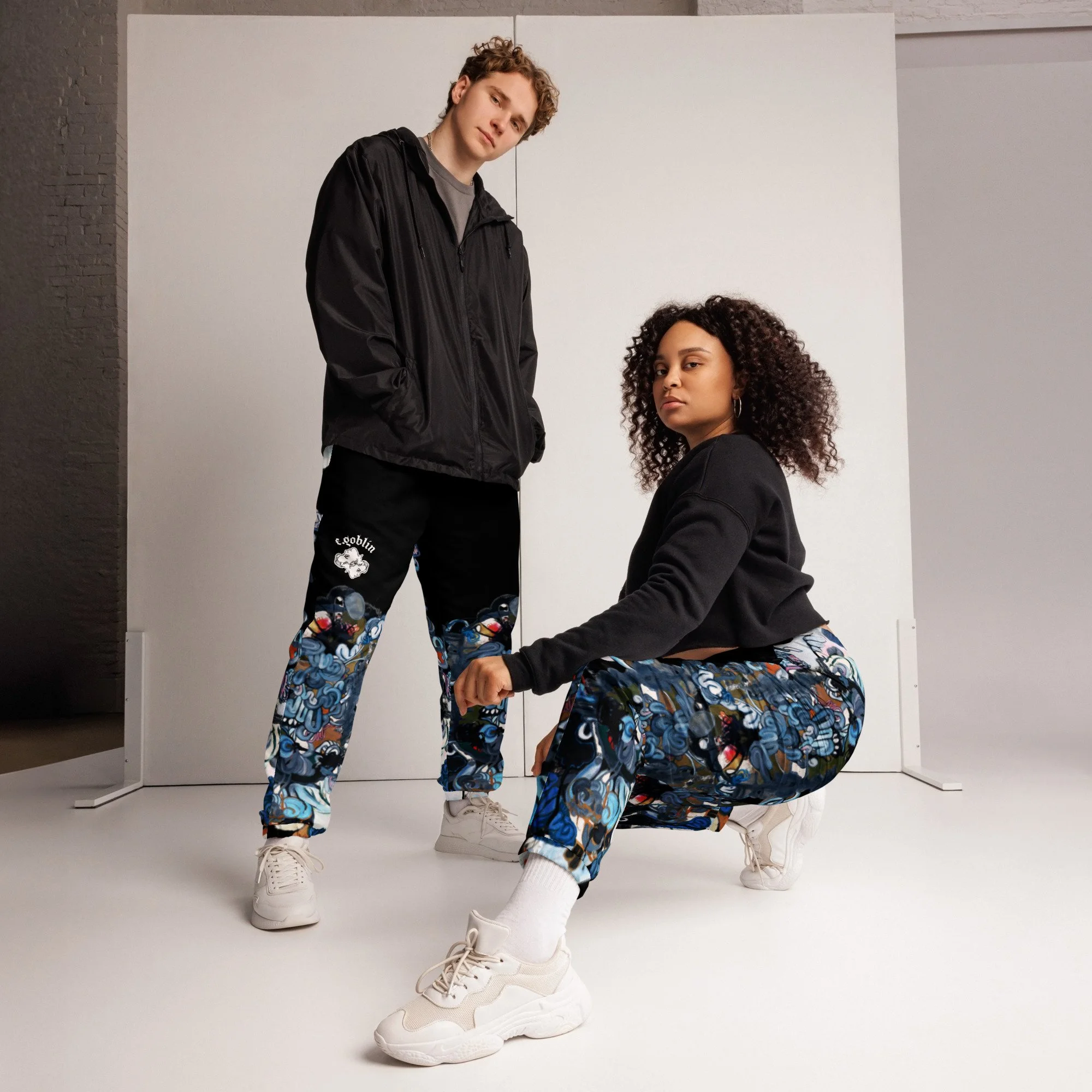 all-over-print-unisex-track-pants-black-front-6a503af3da0fd.jpg