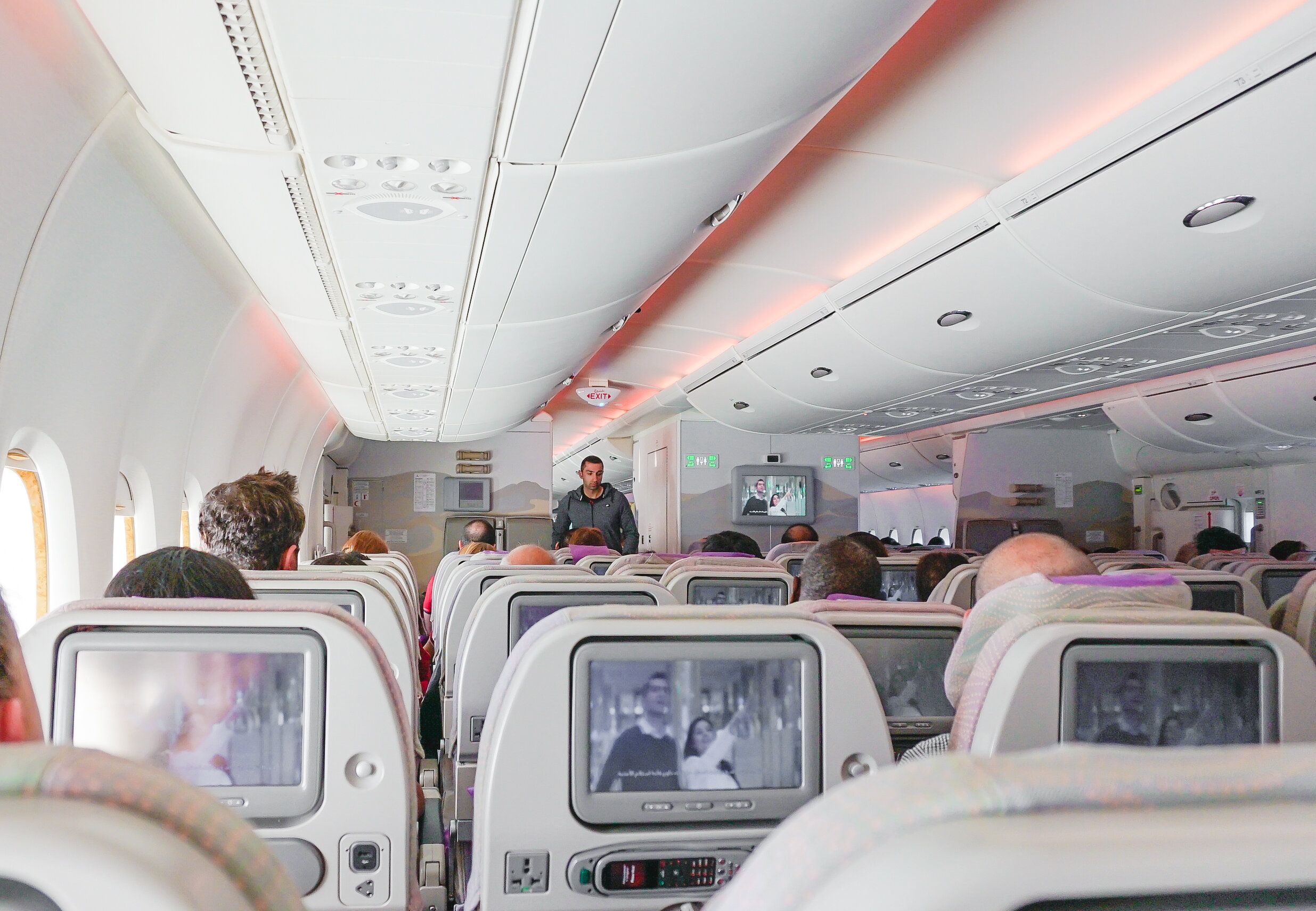 You’re going to want your own t.v. on a long flight and definitely not the middle seat if you are going solo.