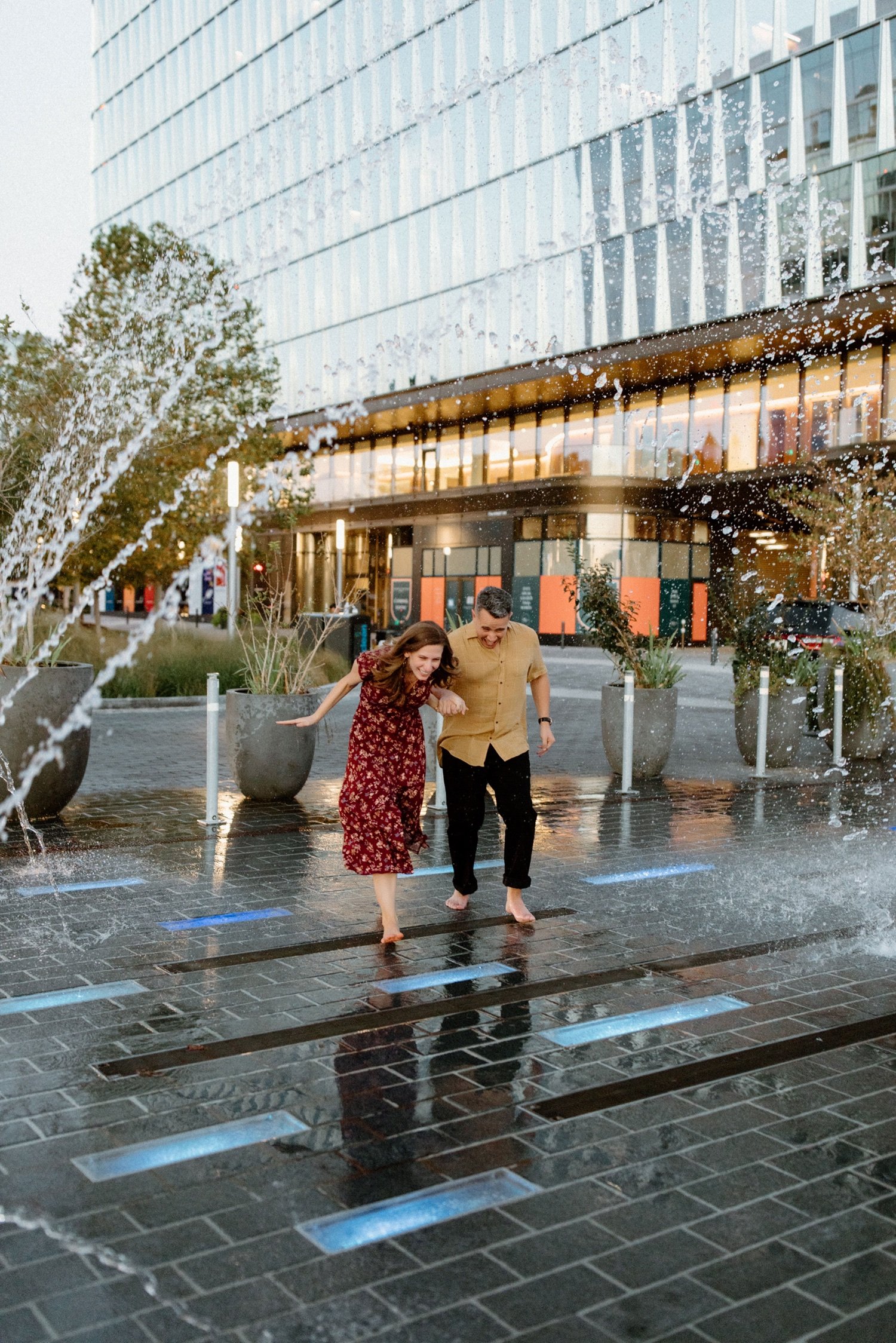 24_The Wharf Engagement Session - Fun - Fountain-207_The Wharf Engagement Session in the fountain.jpg