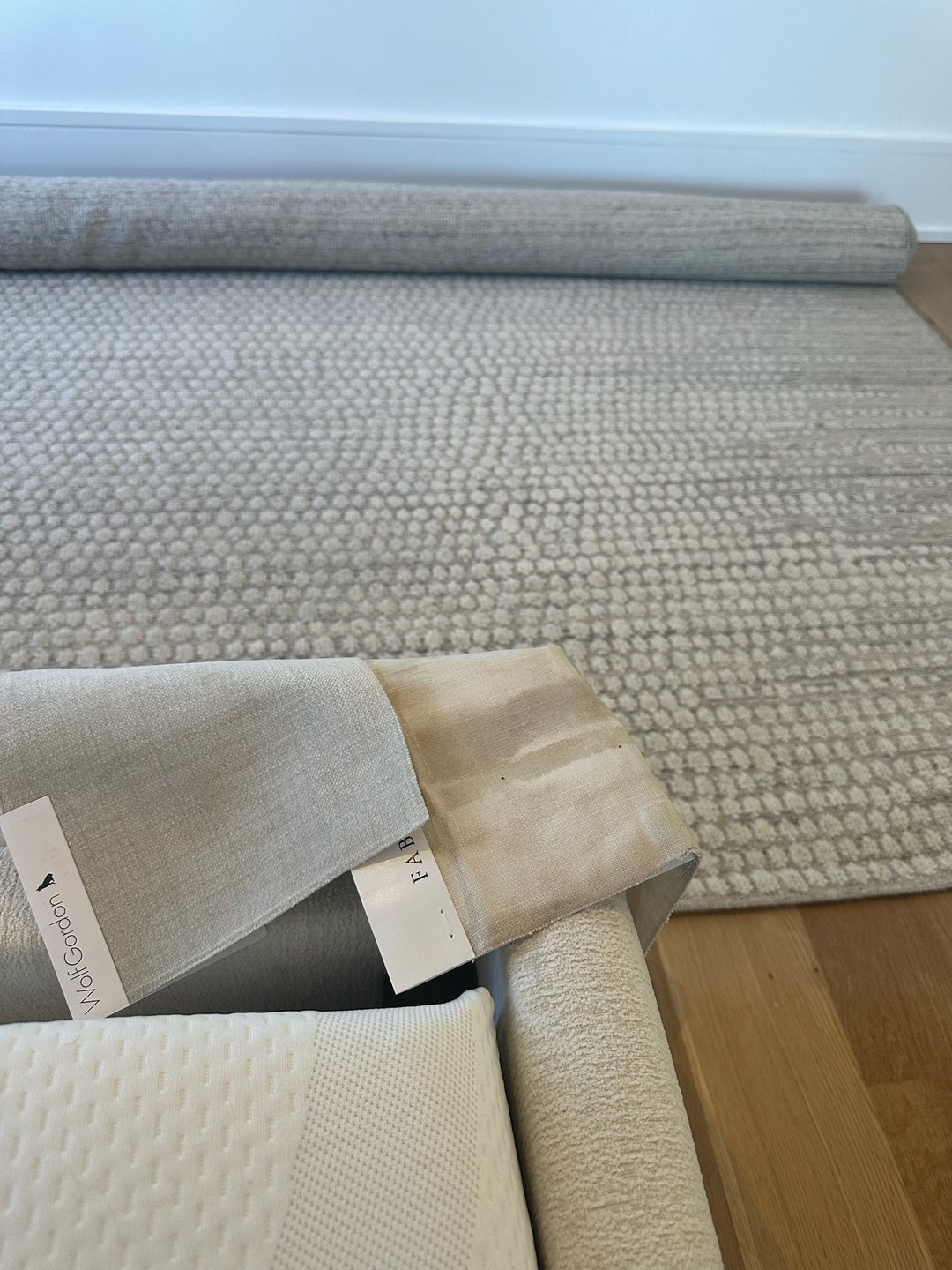 Neutral doesn't have to be boring. 
.
A neutral base palette is a calming canvas for any room. If you desire a clean aesthetic but don't shy away from color entirely, layering larger pieces in a monochromatic color way, i.e. area rug, sofa, bedding, 
