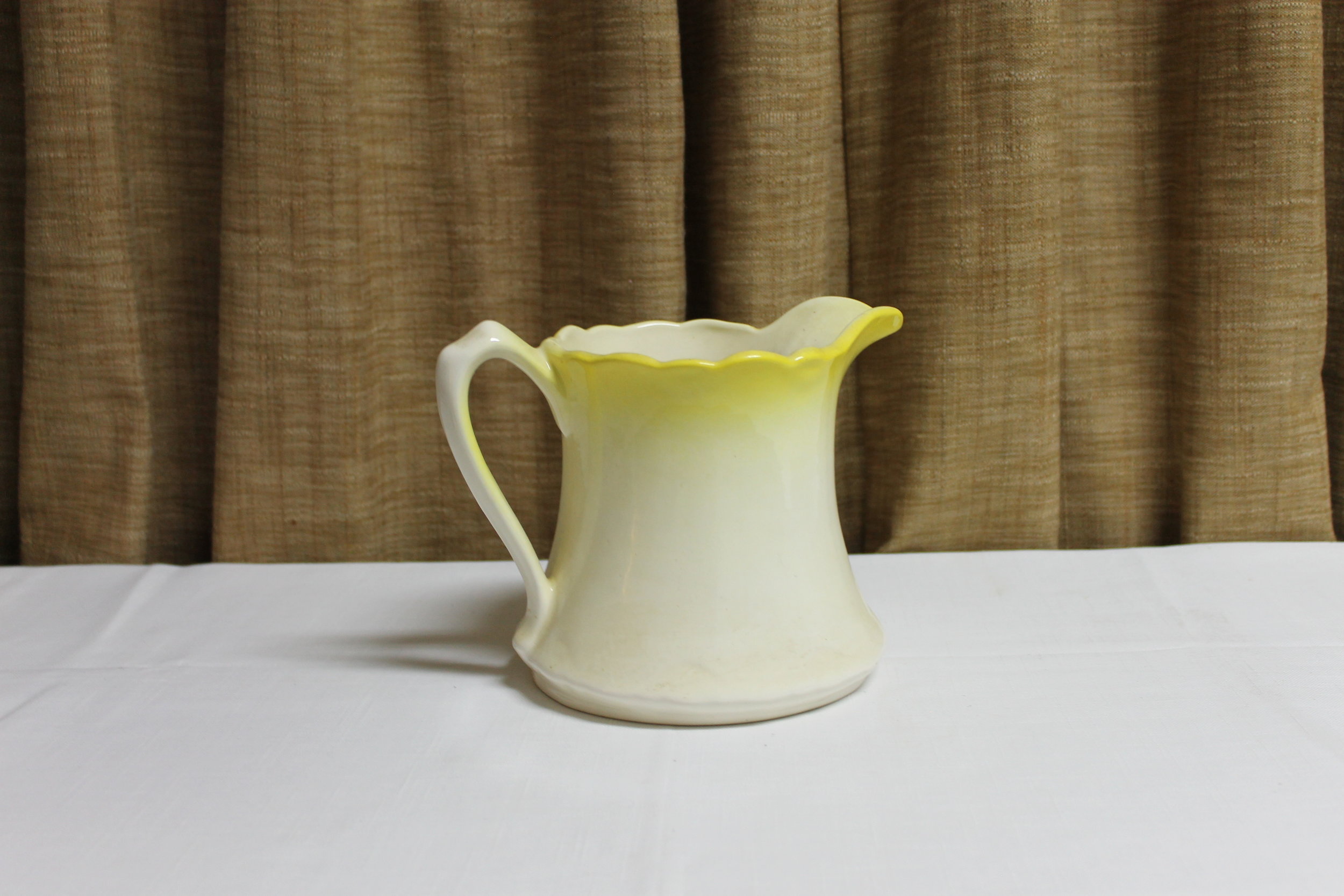 Vintage White with Yellow Pottery Pitcher