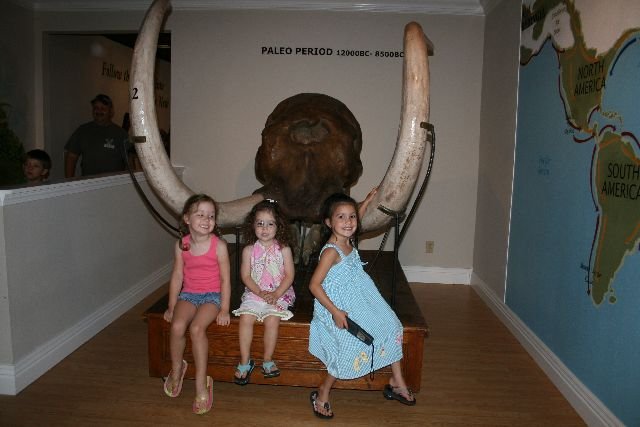 Children Posing in Front of a mastodon skull