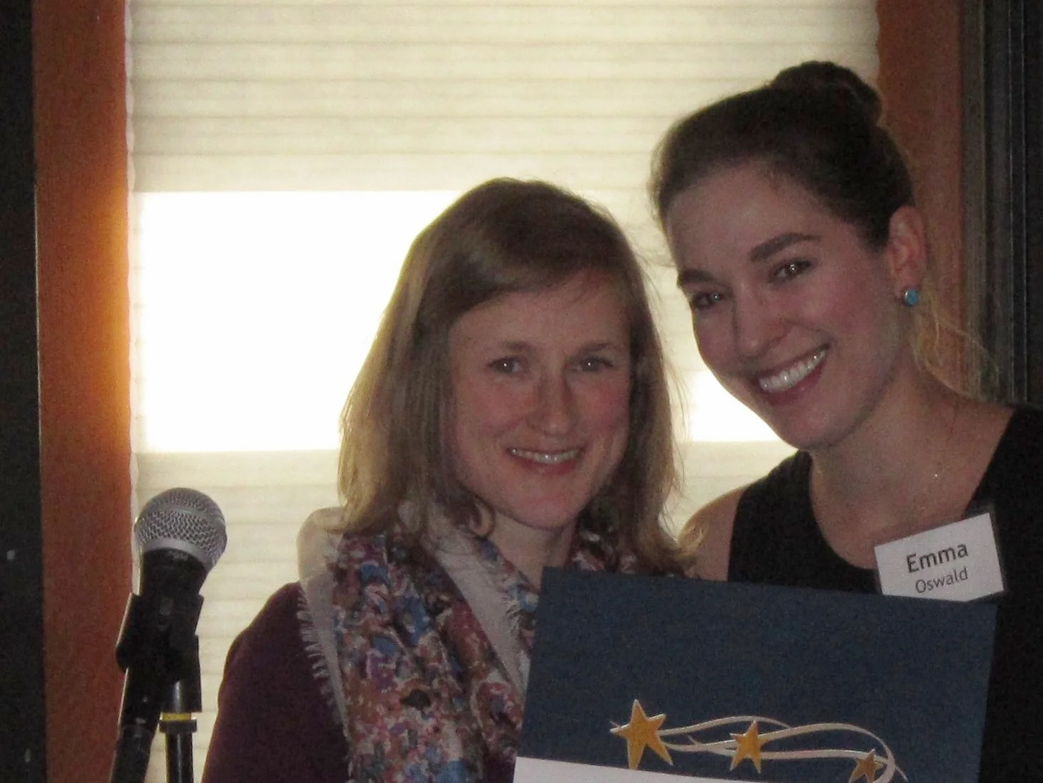 Melanie Kristoferson receiving her scholarship