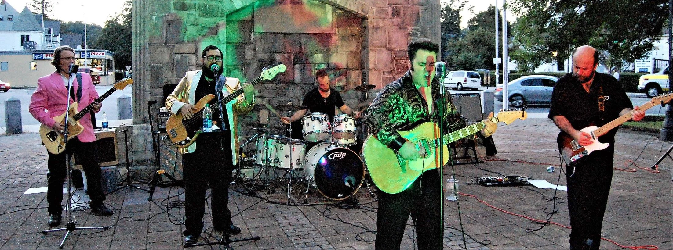 The Fellowship of the King performs at Newton Square in 2017.