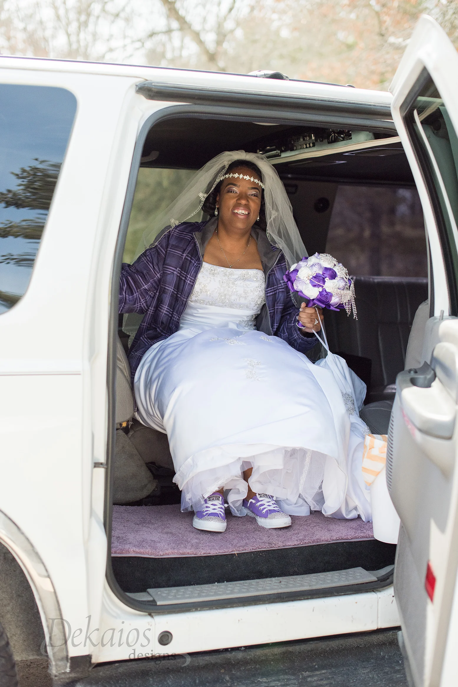 Purple is definitely her color. Love her shoes!