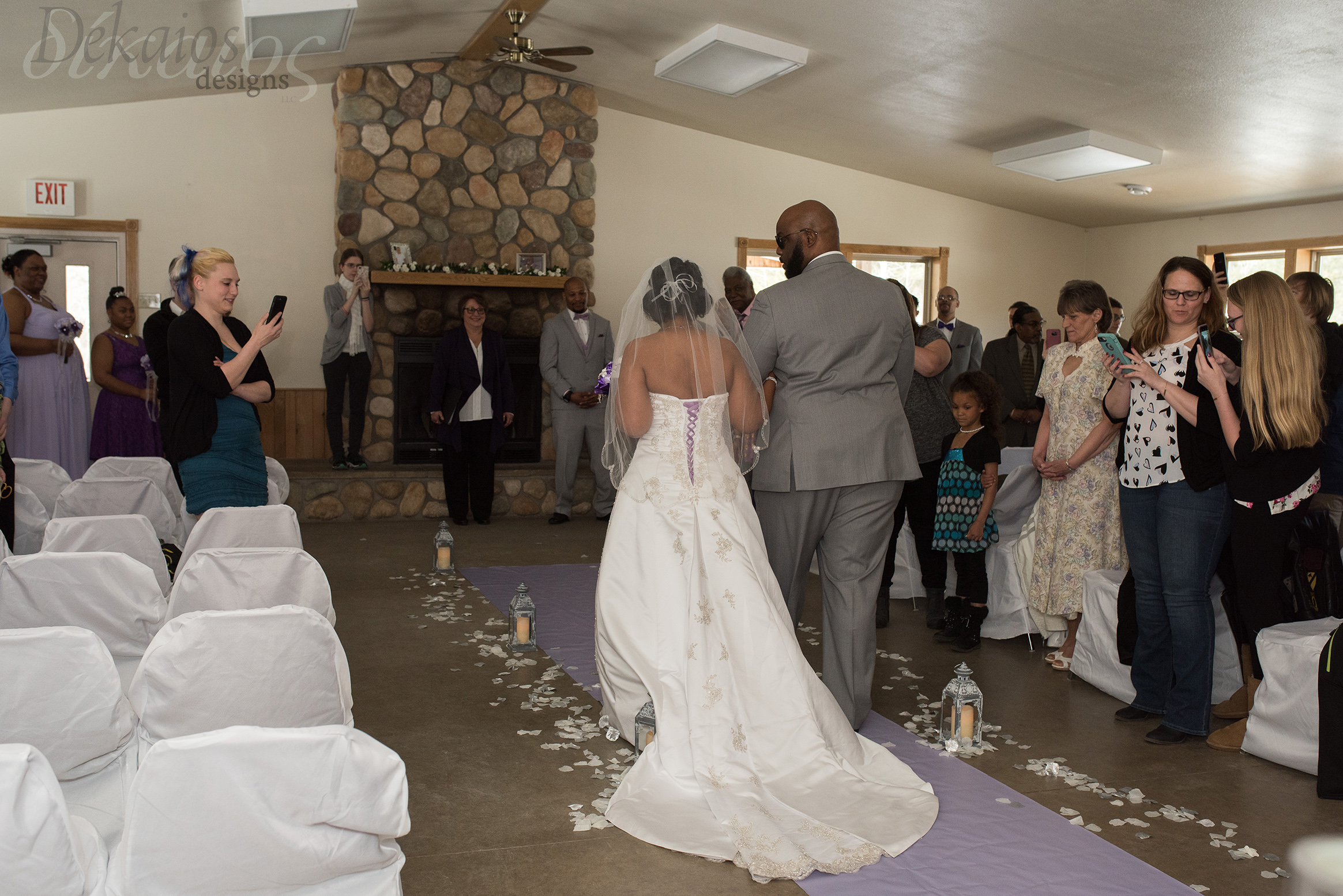 The back of her dress was so unique with the purple ribbons.