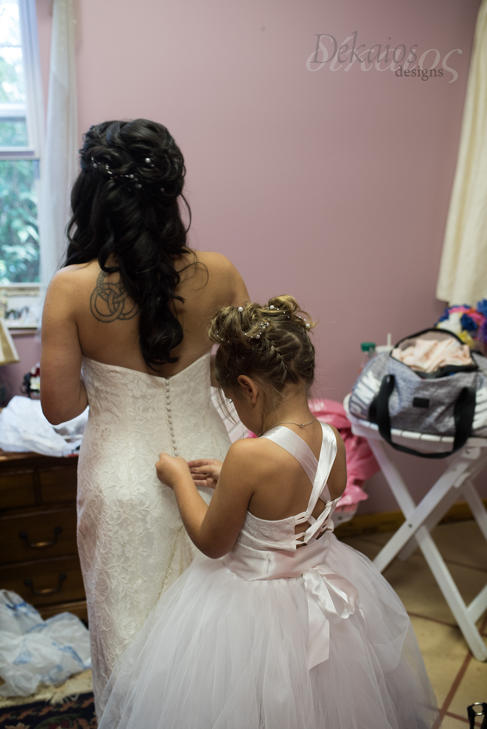 I entered to this sweet moment where Kristen’s daughter was helping mom button her dress. So memorable and special, it’s these moments that get me. I love what I do!