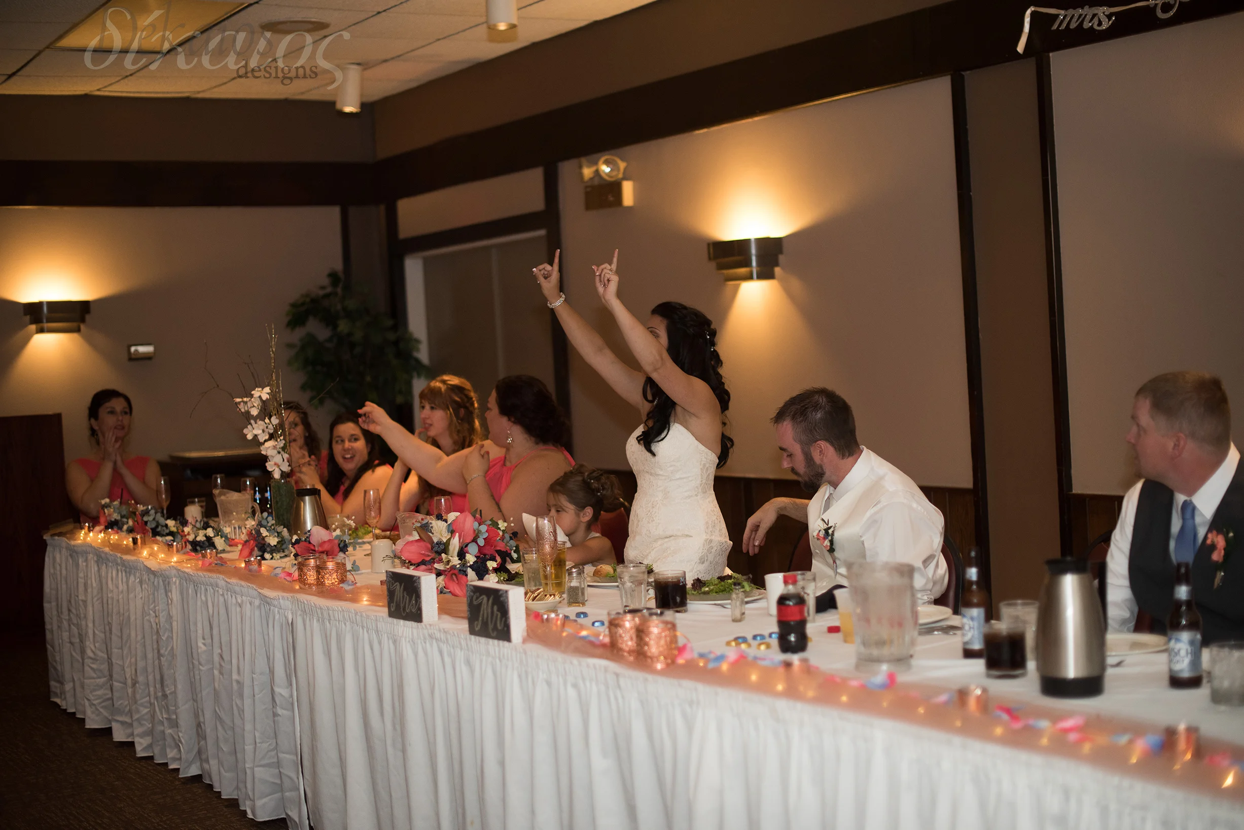 At dinner when the guests tried to clink the cups there was an announcement. They were told they had to sing a love song if they wanted to see a kiss. There was much less kissing! After dinner and cake the dancing began.