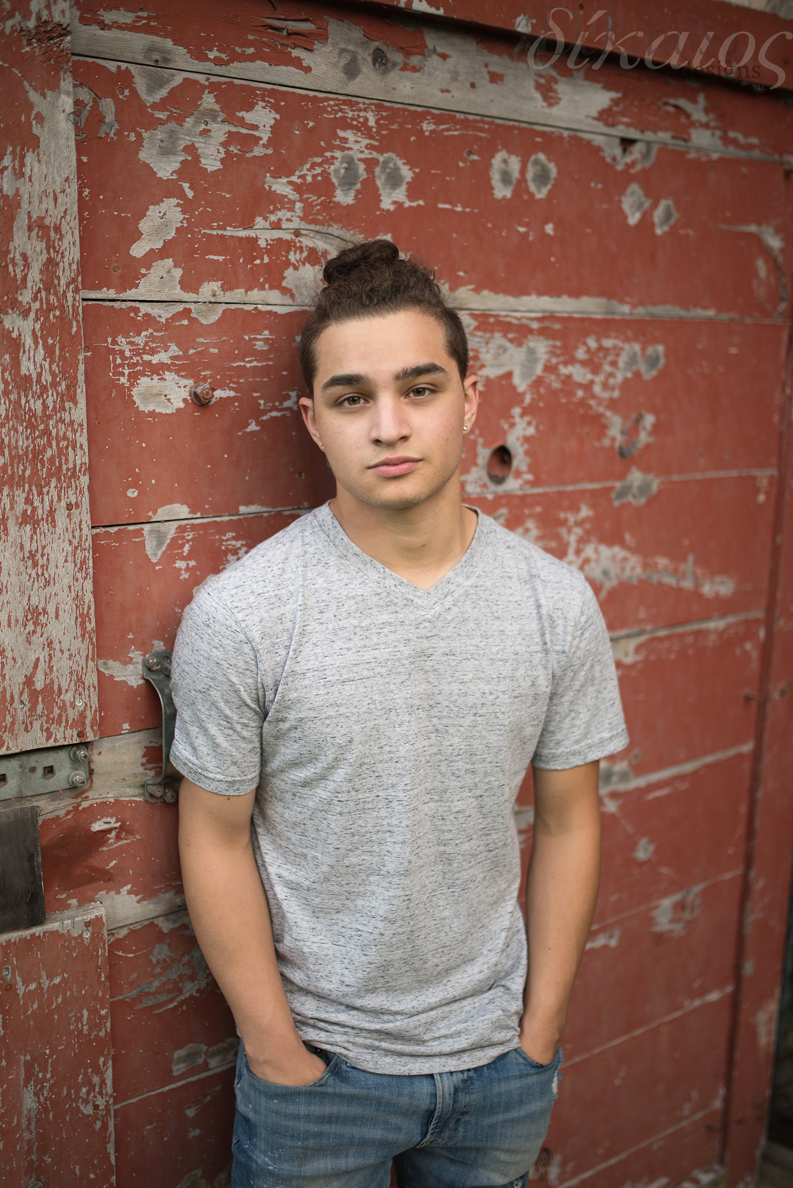 Love this backdrop with his skin tones and shirt.