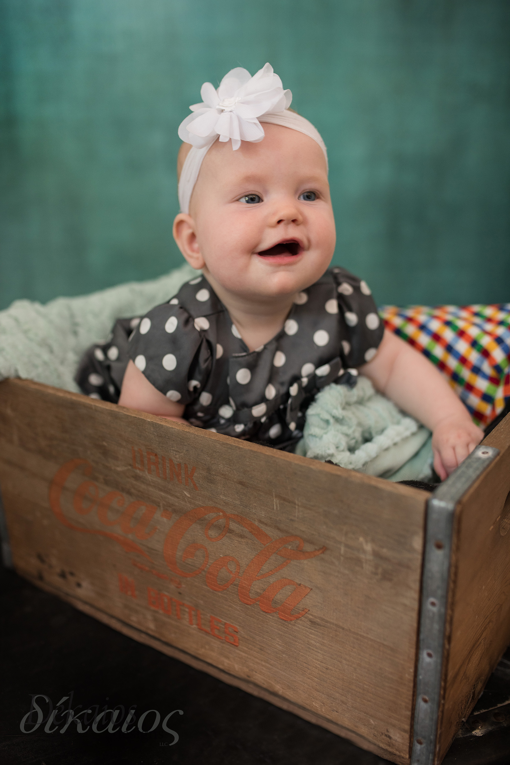 Baby Ginny who we photographed in January turned SIX months!