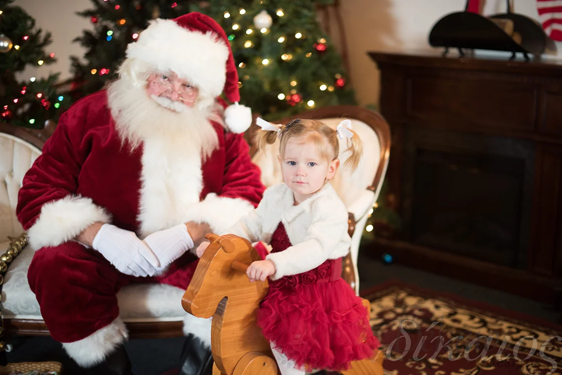 Santa the the Rose House, which is our new space, with sweet little Klaire.
