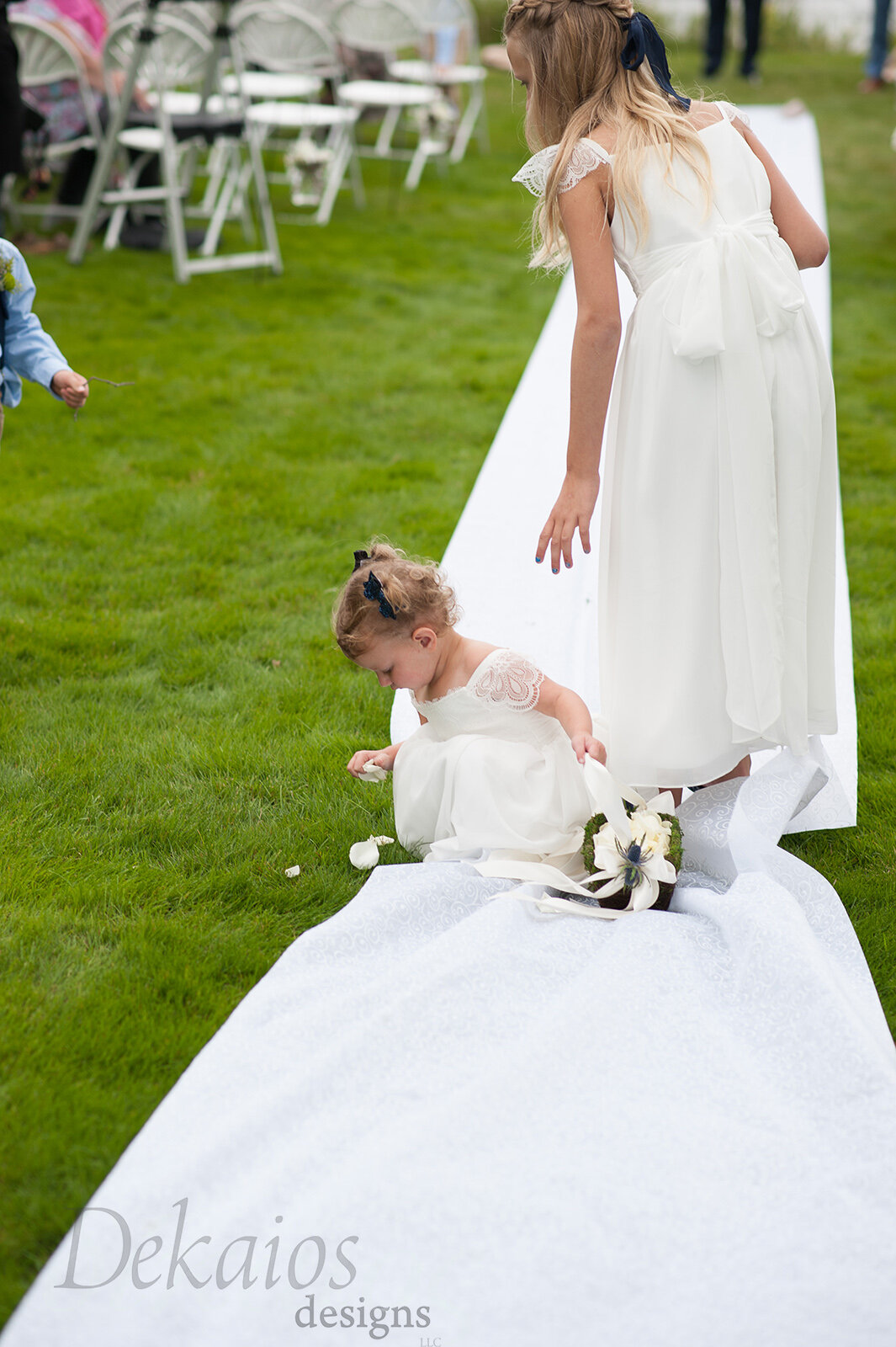 And they are now officially sisters! It was so cute, the older girl was dropping the petals as she should, but the younger was confused and kept picking them up!