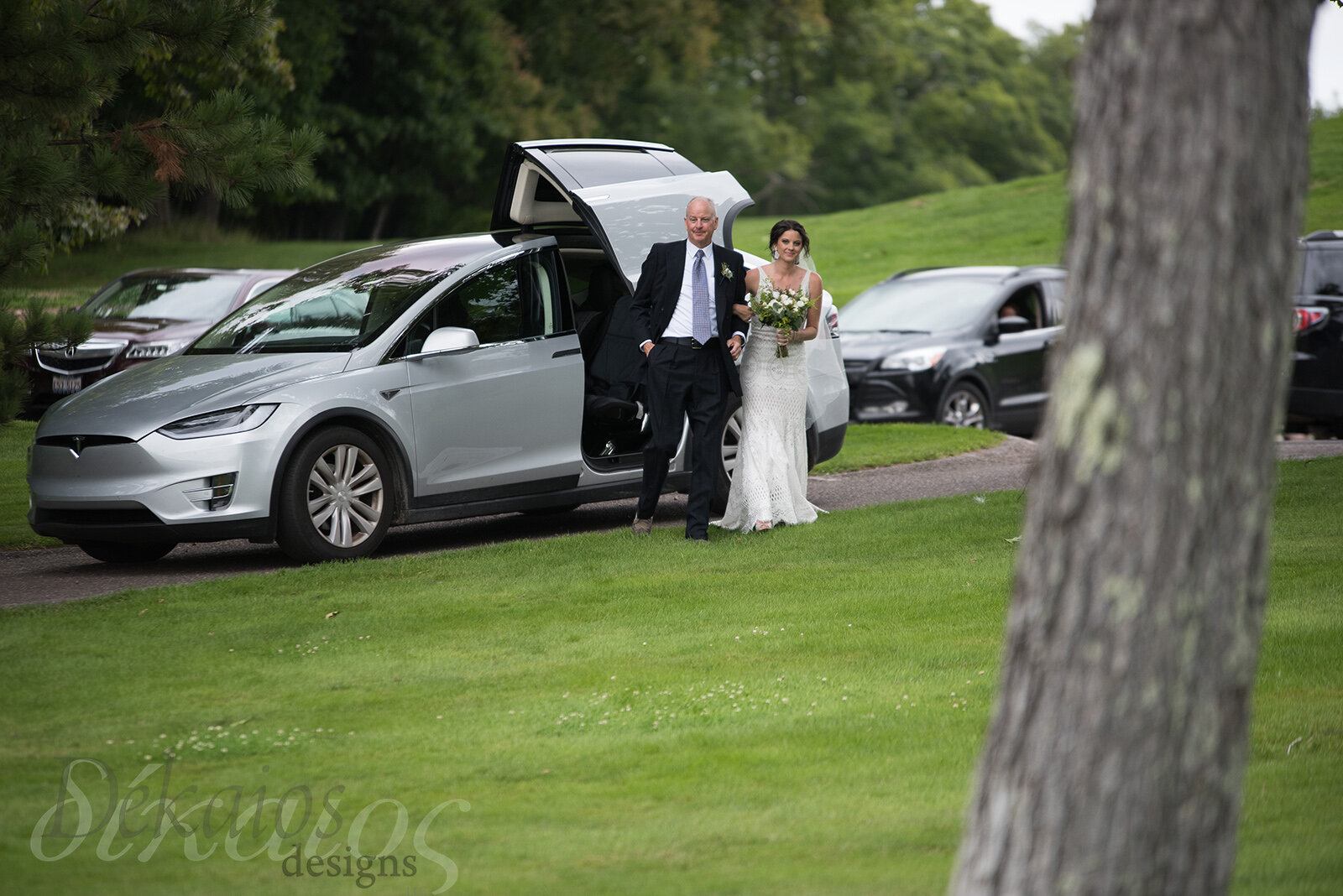 Stephanie and her dad, out of his amazing car.