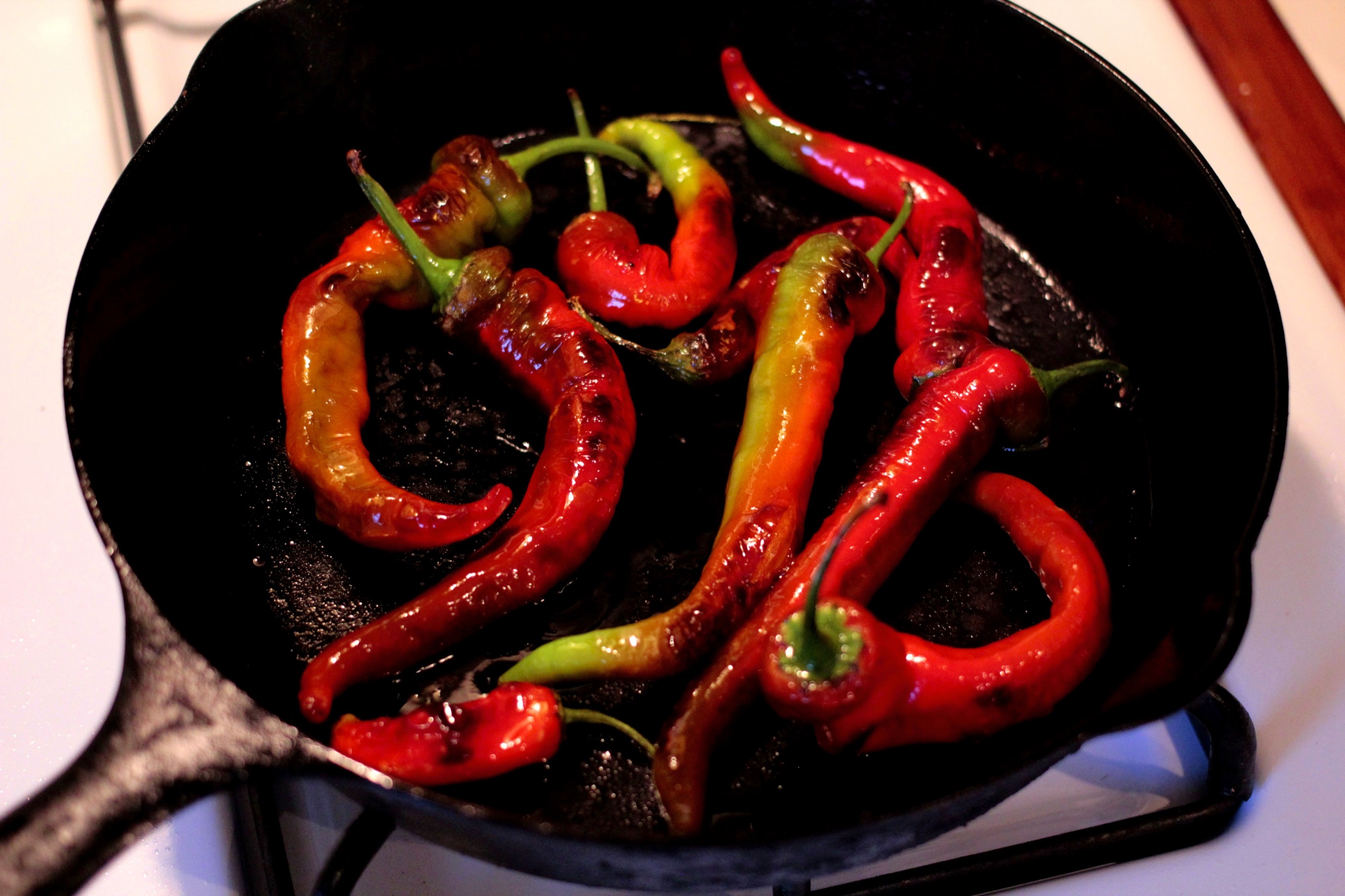 Sizzling, softening.