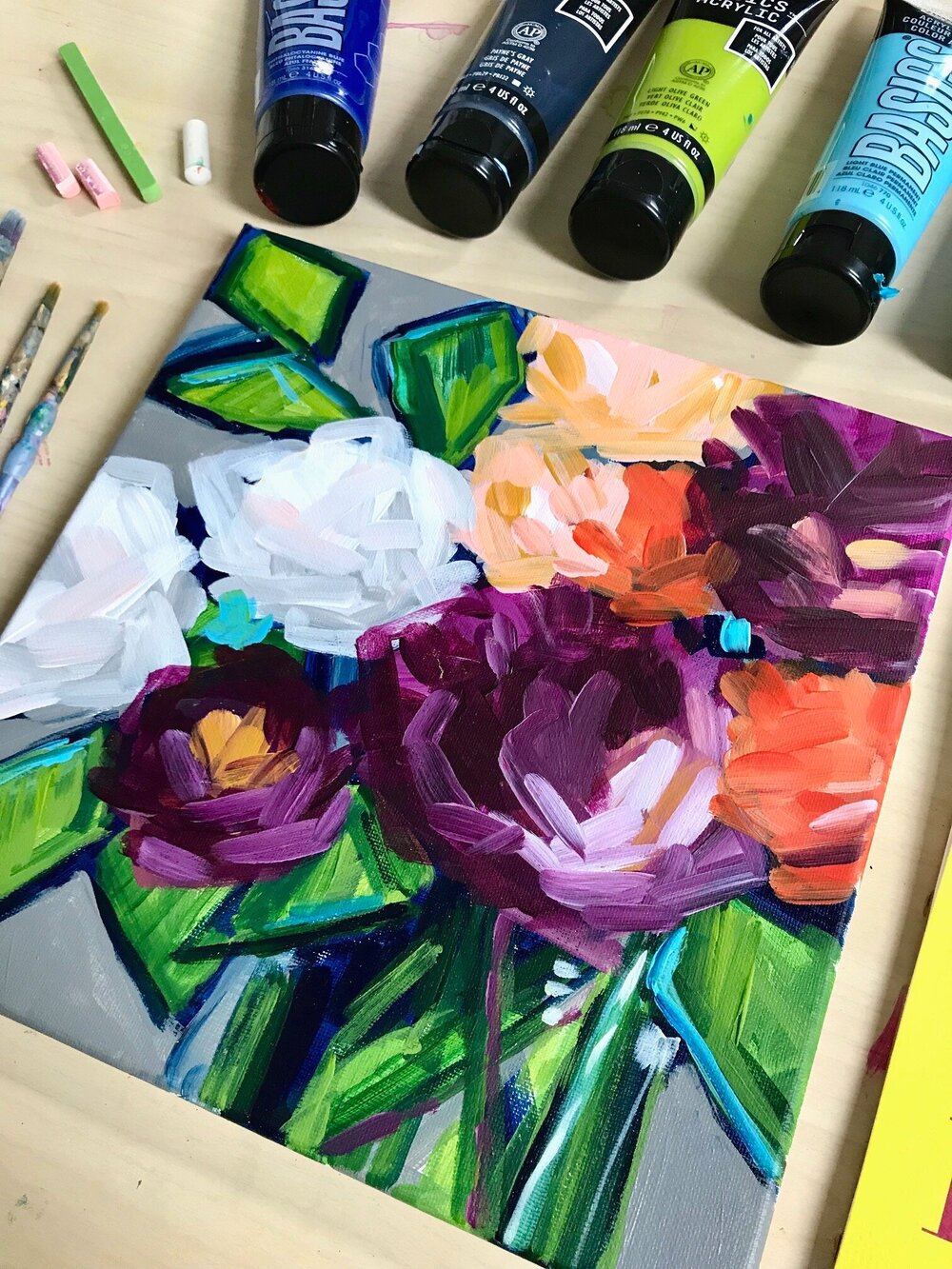 Learn how to paint abstract flowers on canvas with acrylic paint