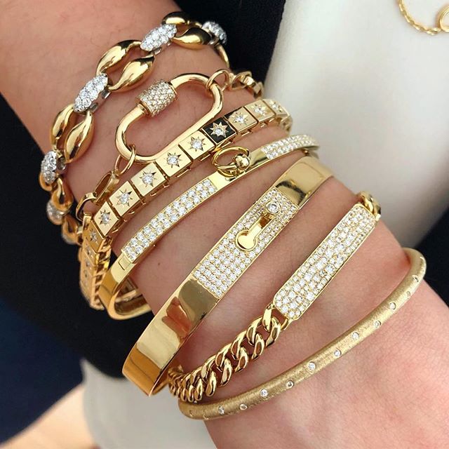 💫🤤🤤🤩#golden #armparty #repost @petitegjewelers
Doesn&rsquo;t get much better than this stack featuring @soferjewelry, @katherineandjosephine, @marlaaaron &amp; @normancovan!
・・・
.
.
.
.
#normancovan#love#diamond#bangle#bracelet#details#18k#gold#y