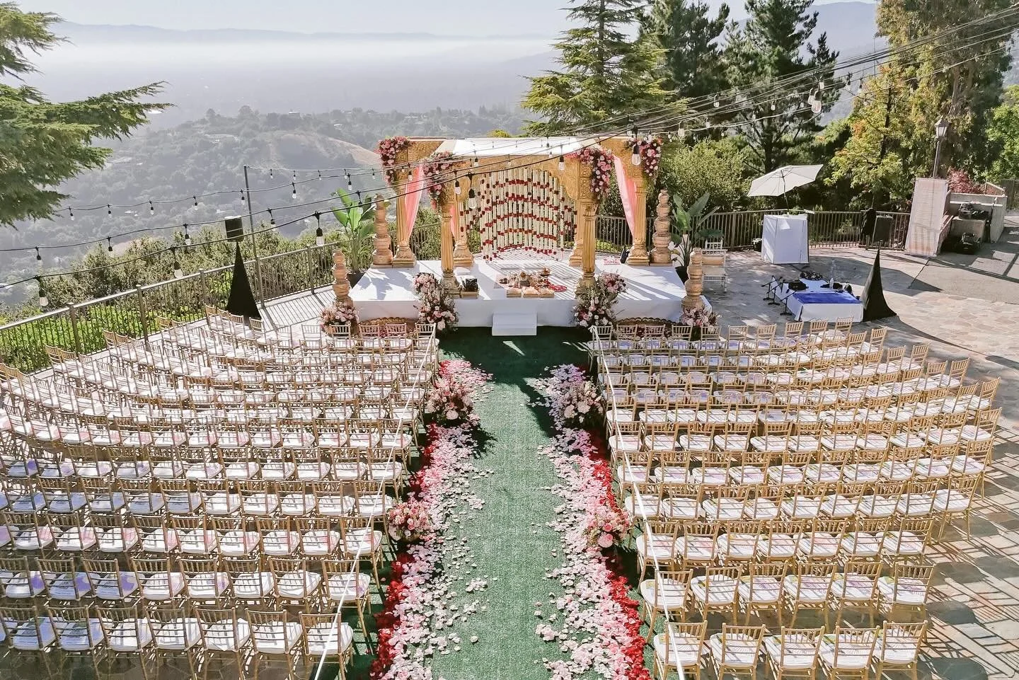Wooden Hindu wedding mandap with custom draping by Saba Decor Rentals.