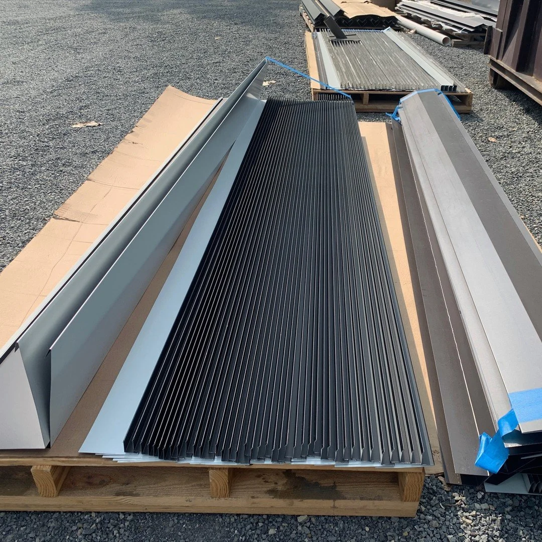 In addition to our #EZCurb product line, AMS is also your one-stop shop for all standing seam roofing and window and door flashing trim components. 
We work with roofers and builders to come up with custom trim profiles and solutions for projects