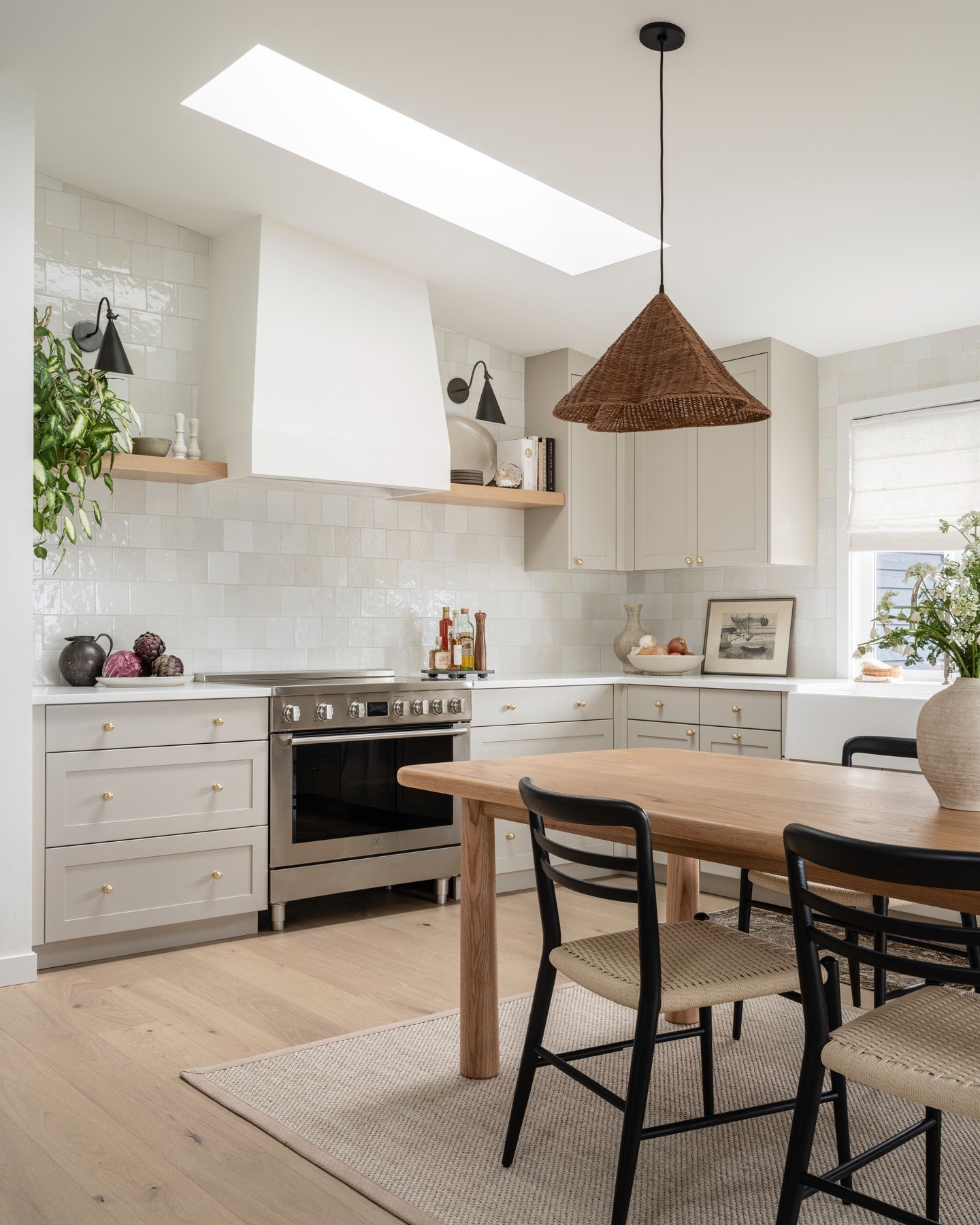 When we first met this kitchen, it was completely cut off from lovely western facing lake views. The choppy spaces certainly weren't serving this family of six, so we blew it up and embraced the English &quot;dining-table-as-island&quot; design appro