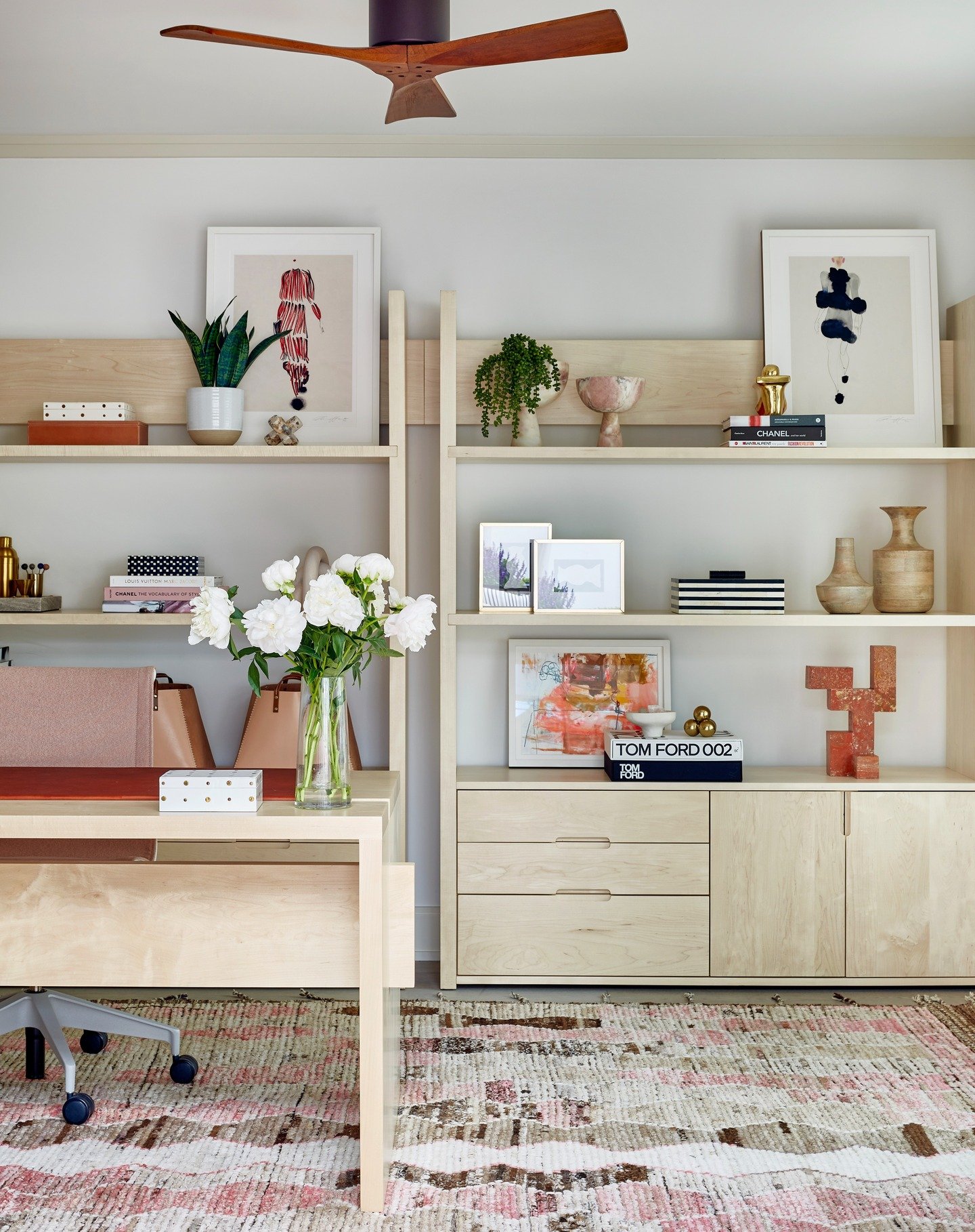 There's something wonderful about dusty rose paired with a rusty cognac hue. This office/art studio is pretty in pink and bleached maple and our team relished sourcing all the art, trinkets, and treasures.

#counterbalancestudio #interiordesignseattl