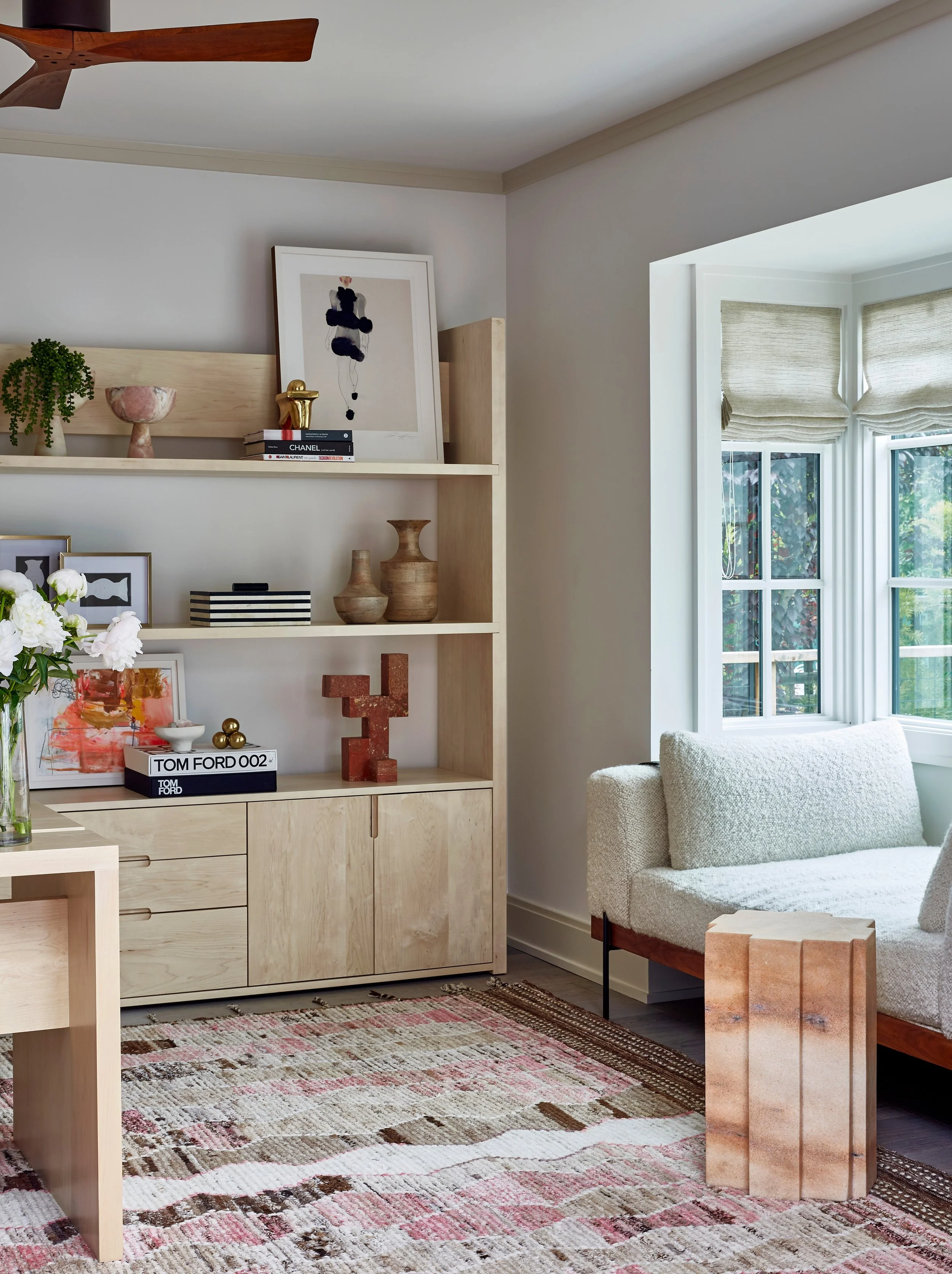Pretty in pink&hellip; and leather, and wool, and maple! 

This one-of-a-kind Afghani rug provides a playful groundwork for the room, while the custom bleached-maple furniture beautifully structures the space. To bring it all together, we layered in 