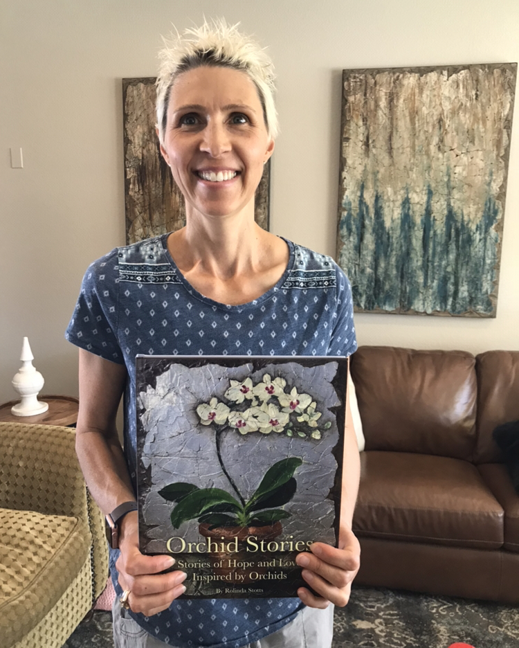Stephanie holding her copy of the sold out Limited Edition of Orchid Stories. October 2018