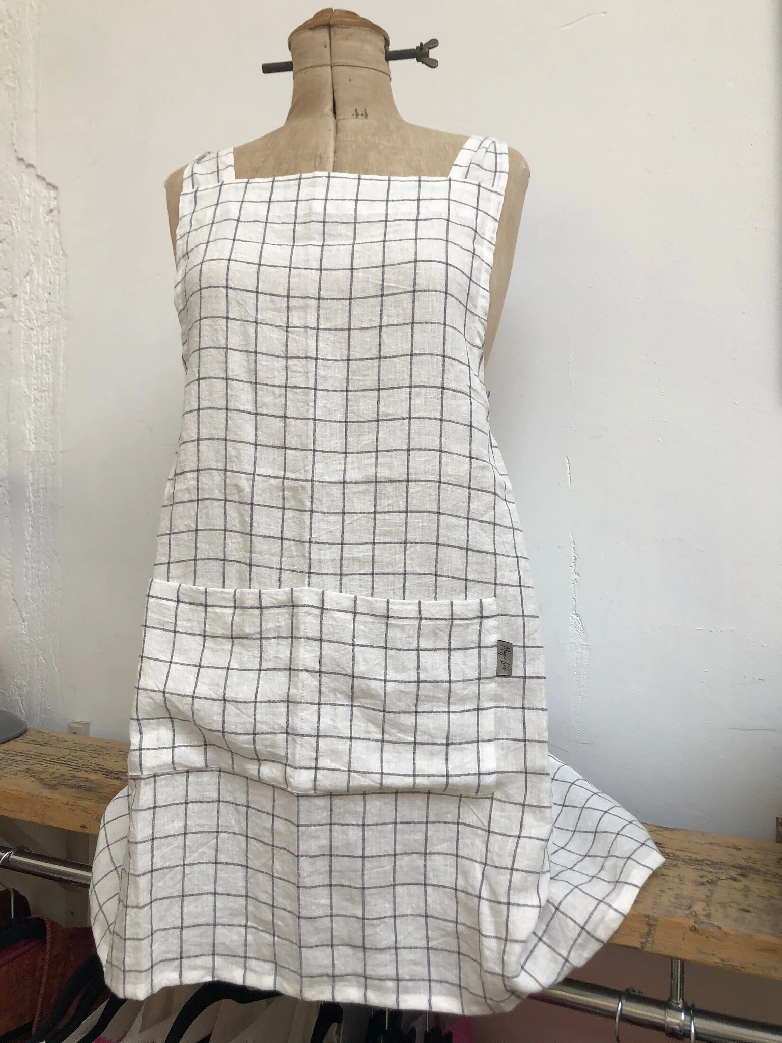 Linen check cross over at the back apron, £55