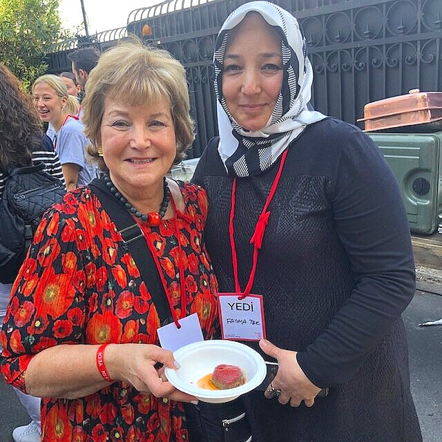 Johanna with a Syrian woman who was a student at the LIFE project at a conference in Istanbul – with her delicious swiss chard dumpling!