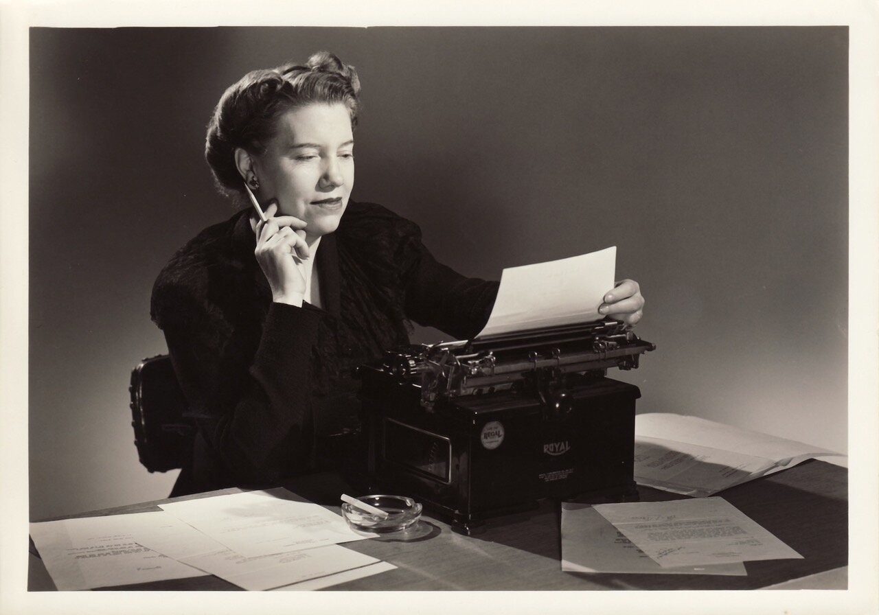 Nell at work on her typewriter.