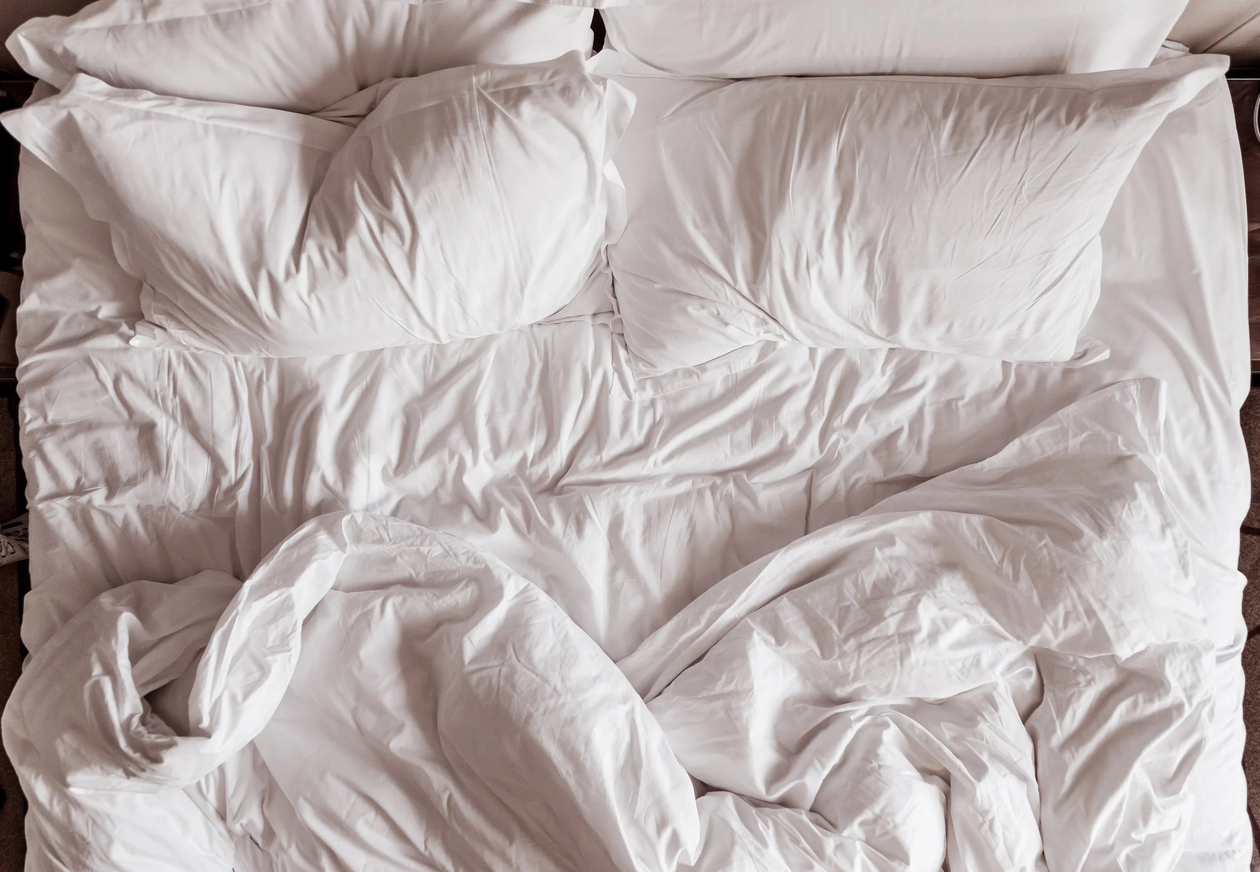 top-view-of-bedding-sheets-and-pillow-PN5T93E.jpg