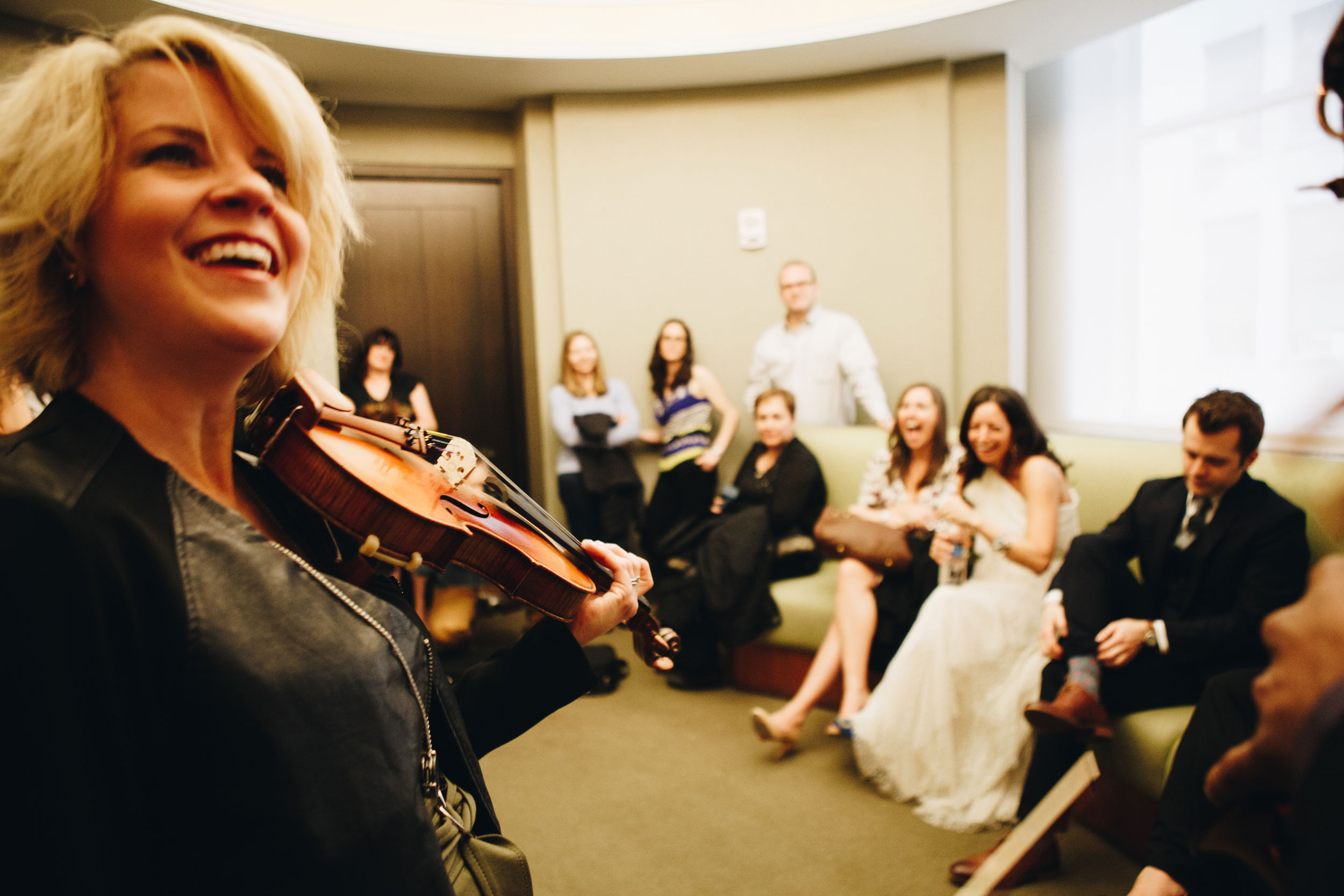 A guest of the wedding playing violin