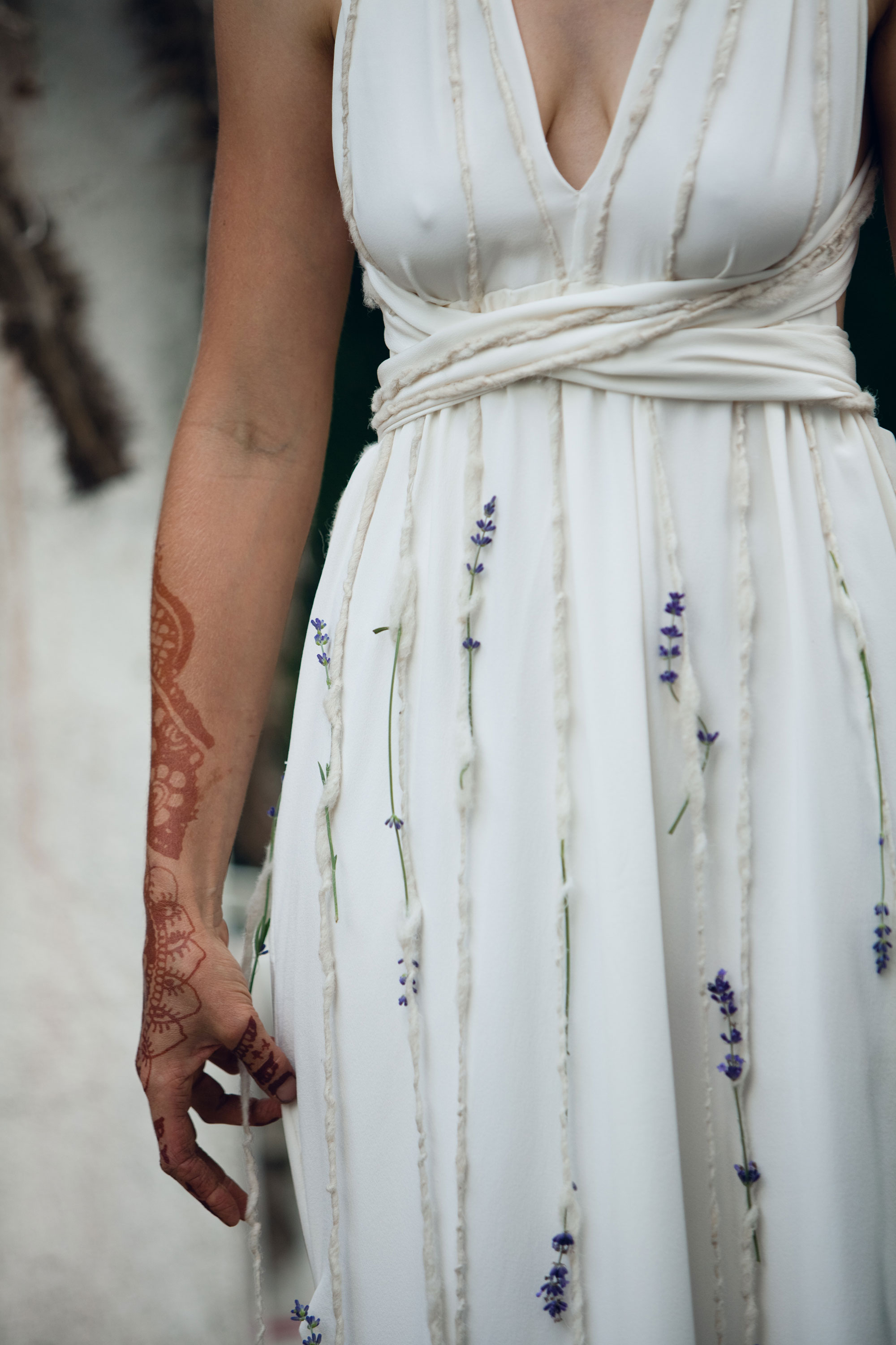 A detail of a brides dress
