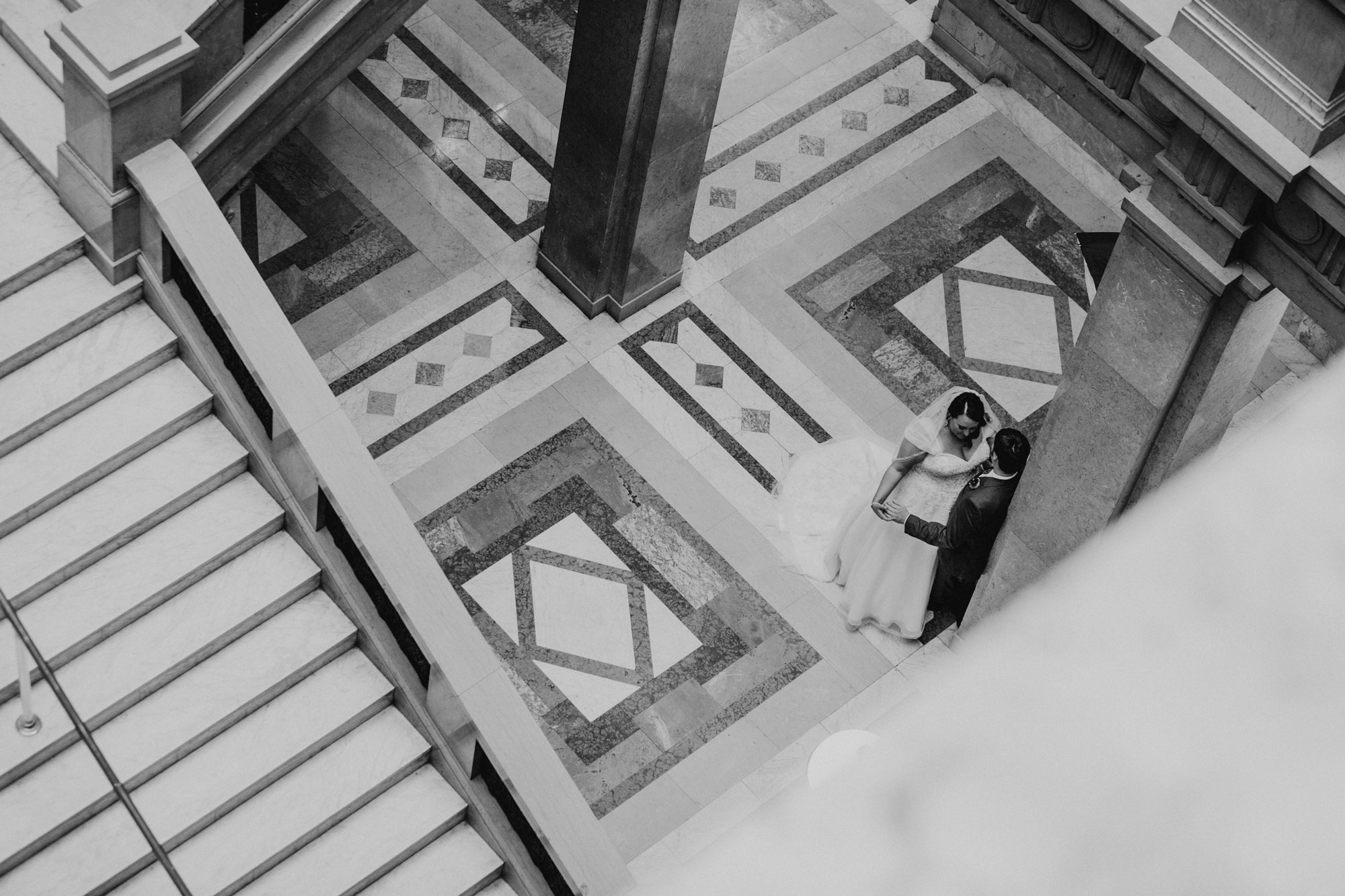 A couple embracing at the Carnegie Museum of Natural History