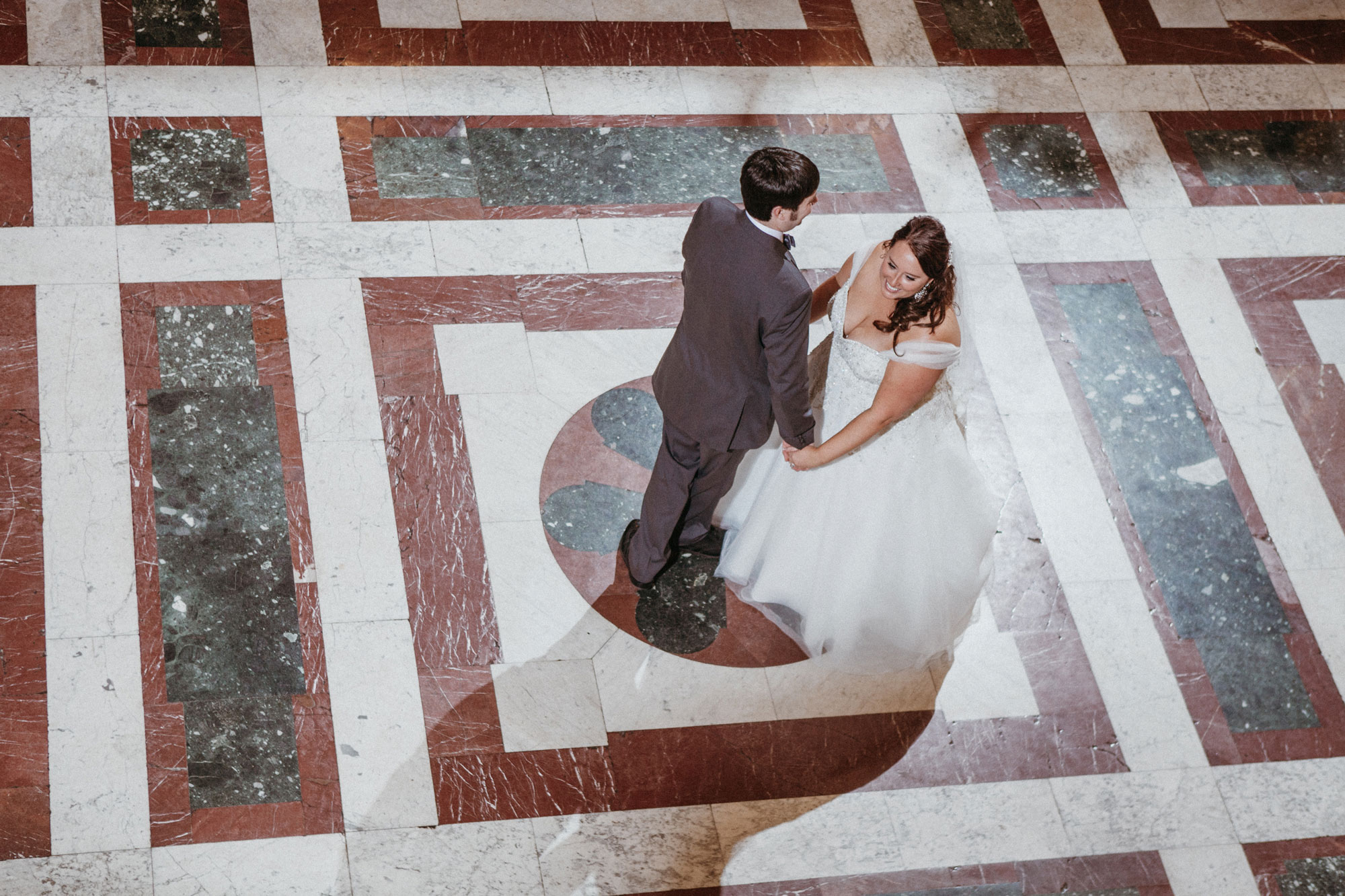 A couples first dance at the Carnegie Museum of Natural History