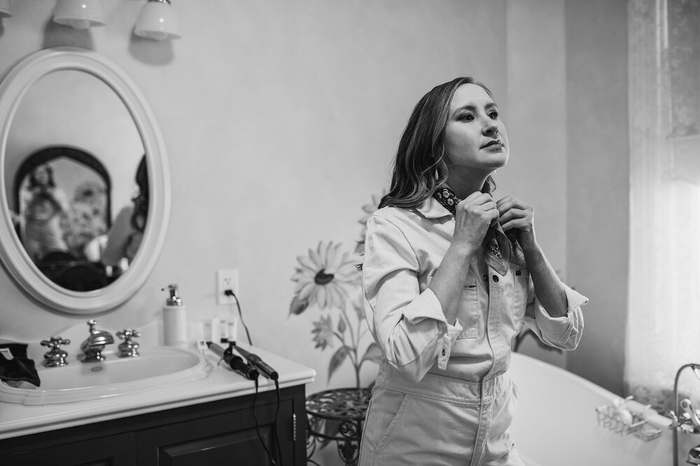 bride working on her final touches before the wedding