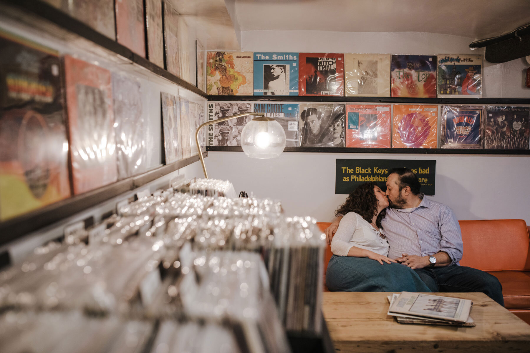 a couple in a record shop in Northern Liberties