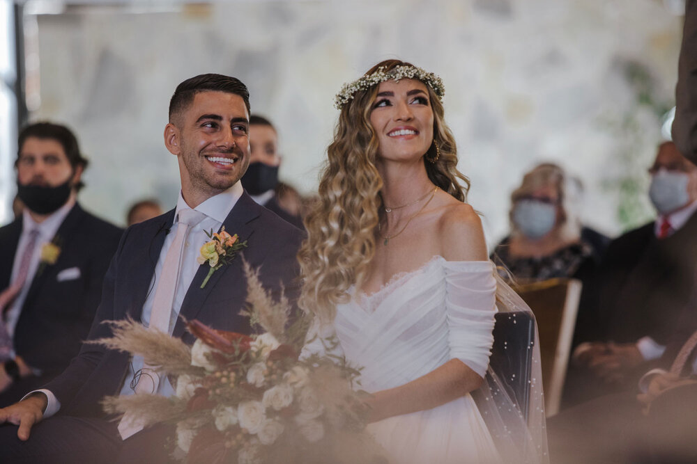 a bride and groom during their wedding ceremony