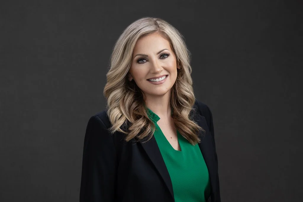 Professional headshot of a Boise business professional taken in 2023, representing an earlier stage of her corporate career