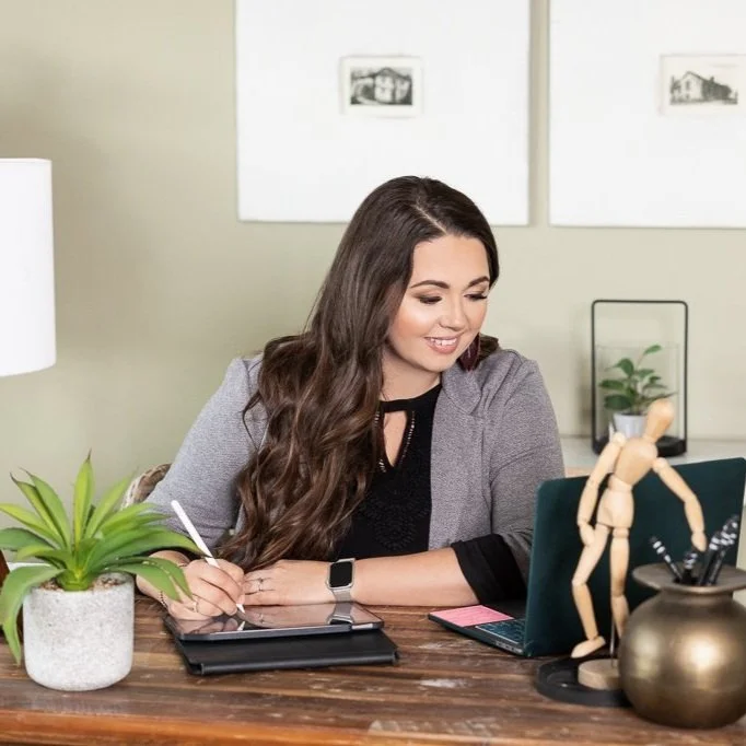 Lifestyle branding photo of Idaho woman entrepreneur working in business workspace