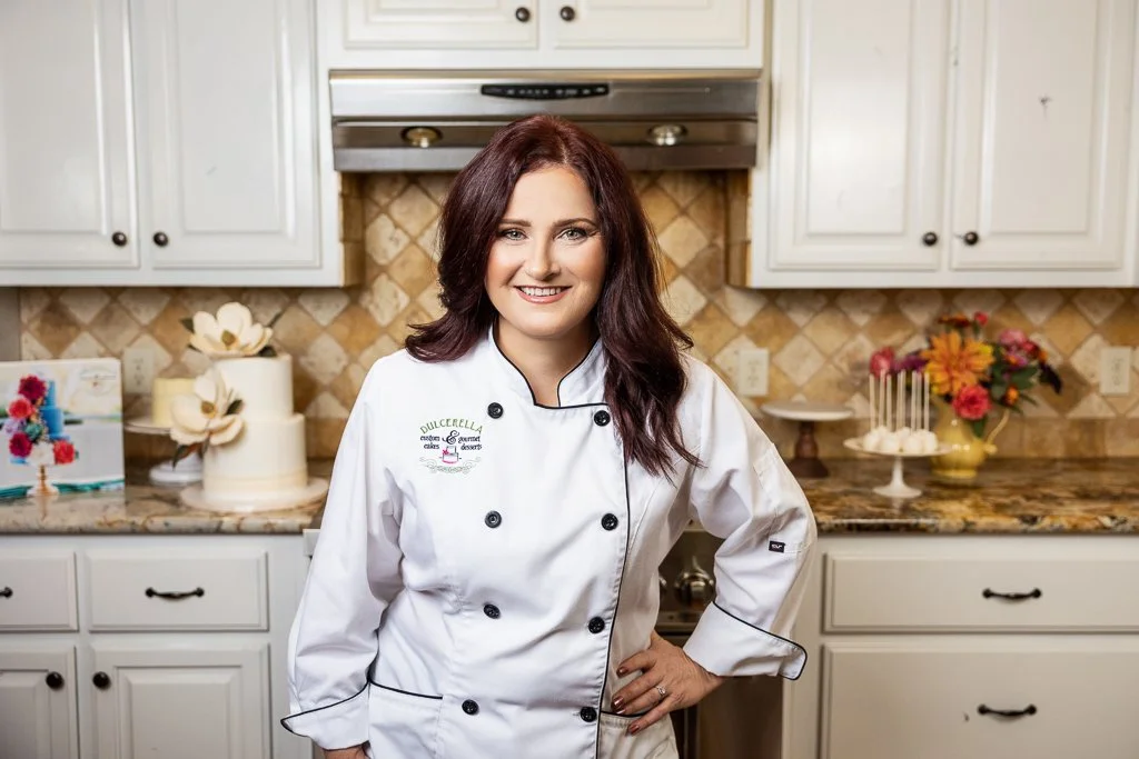 Personal branding photo of a cake designer posing in her kitchen