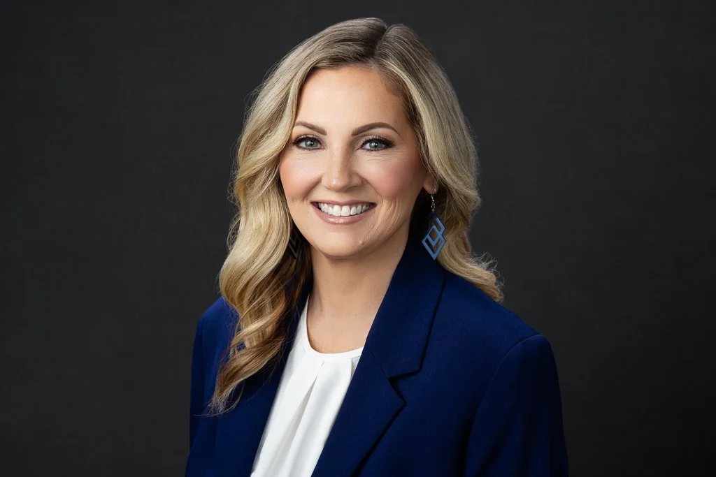 headshot with blue blazer white blouse