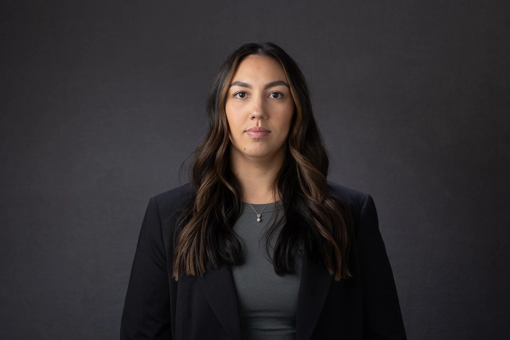 Woman standing in neutral posture before guided posing during Boise professional headshot session