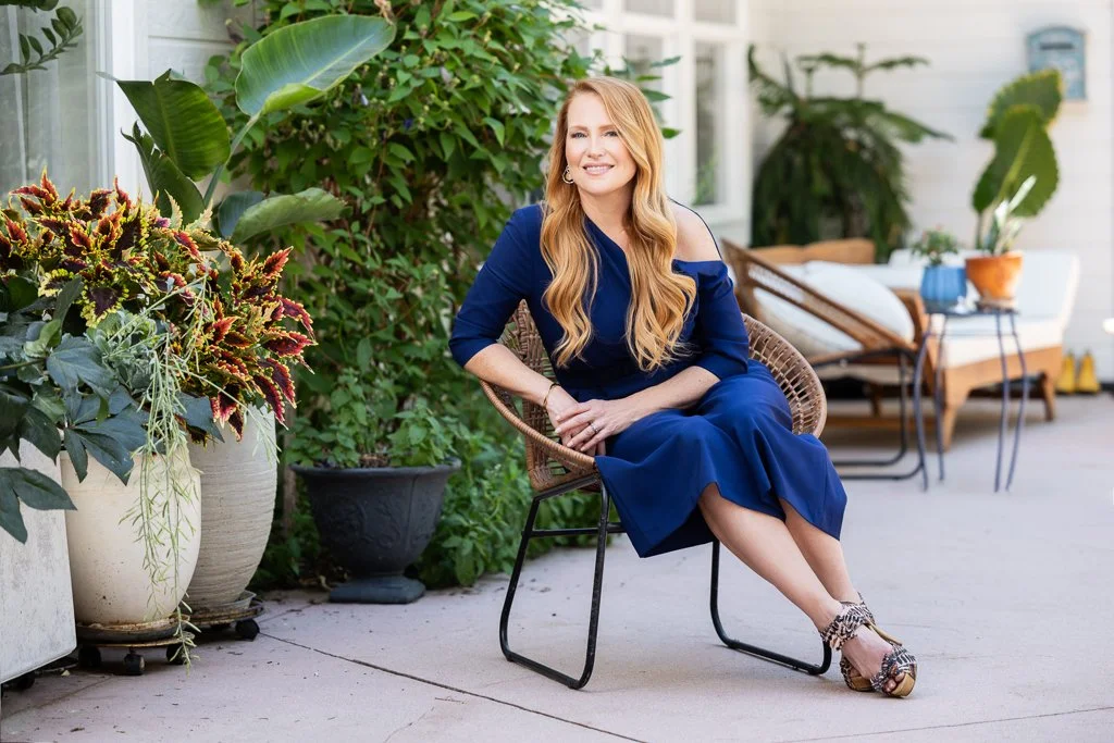 Business owner seated on an outdoor patio during a Boise personal branding photography session.