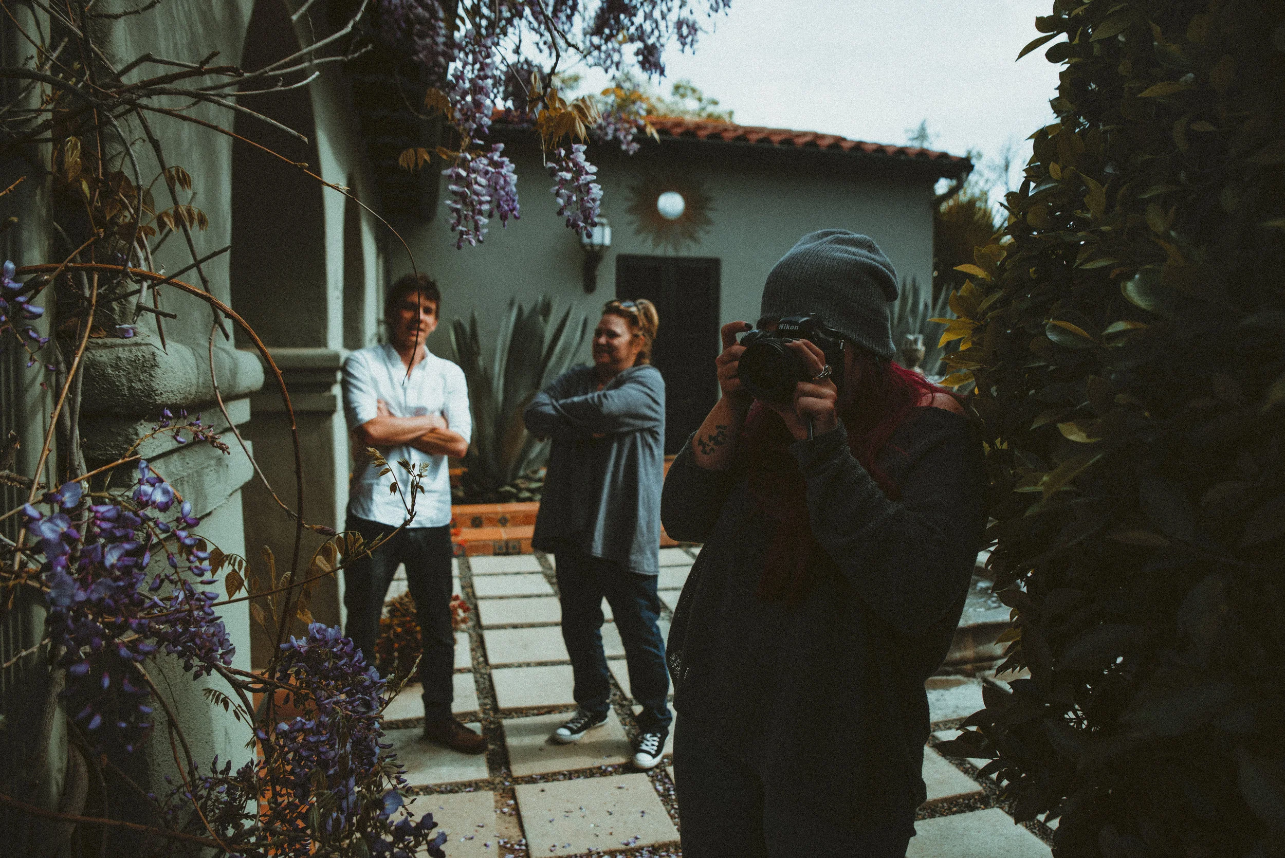 Joe and Mom shooting the breeze while I take a picture of the makeup artist turned bts photographer Hali McGowan